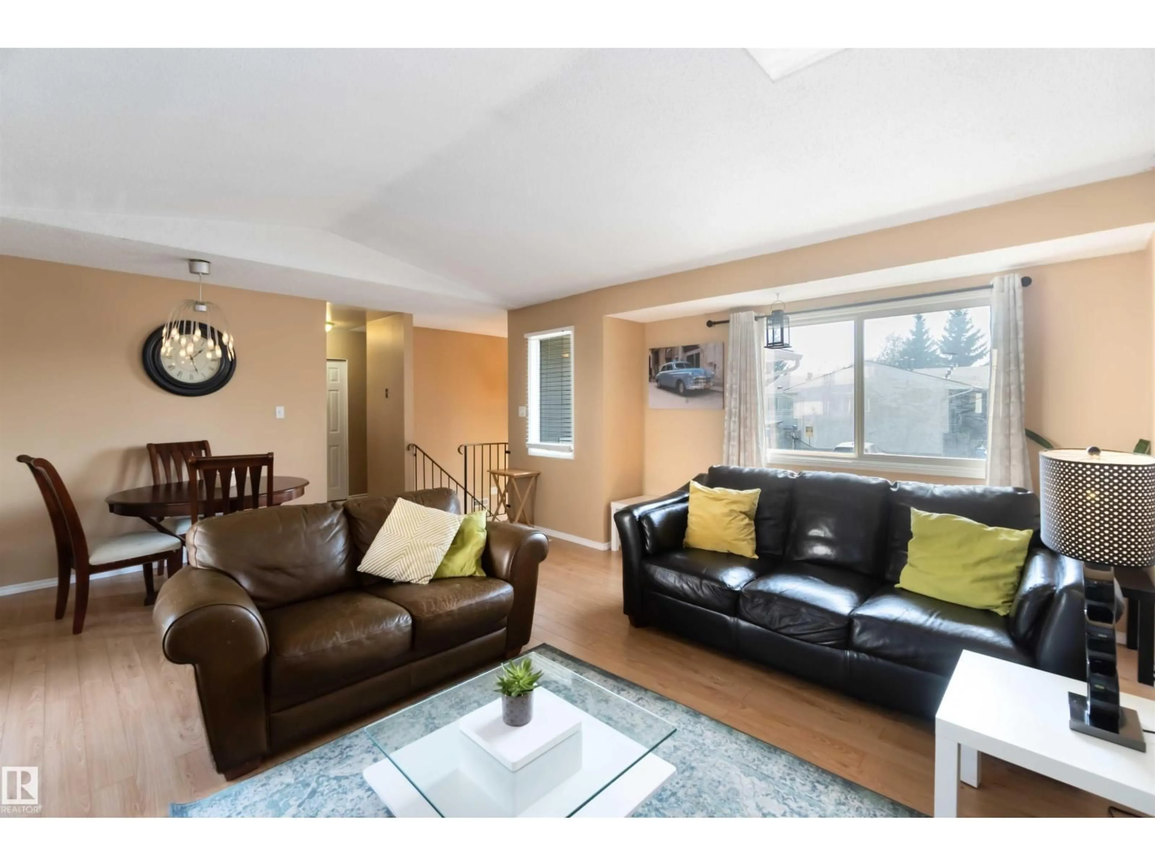 Living room with furniture, wood/laminate floor for 546 WILLOW CT, Edmonton Alberta T5T2K7
