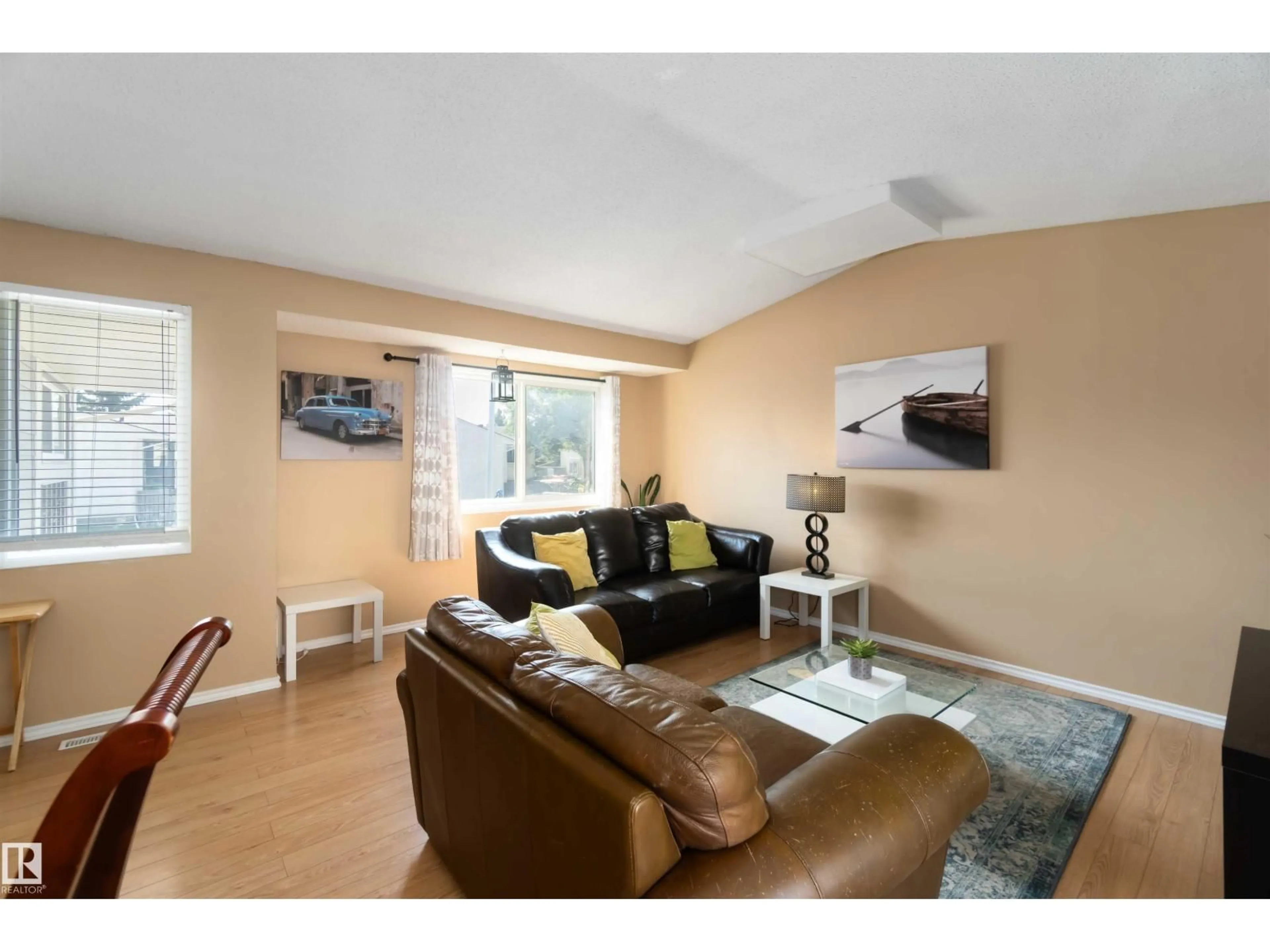 Living room with furniture, wood/laminate floor for 546 WILLOW CT, Edmonton Alberta T5T2K7