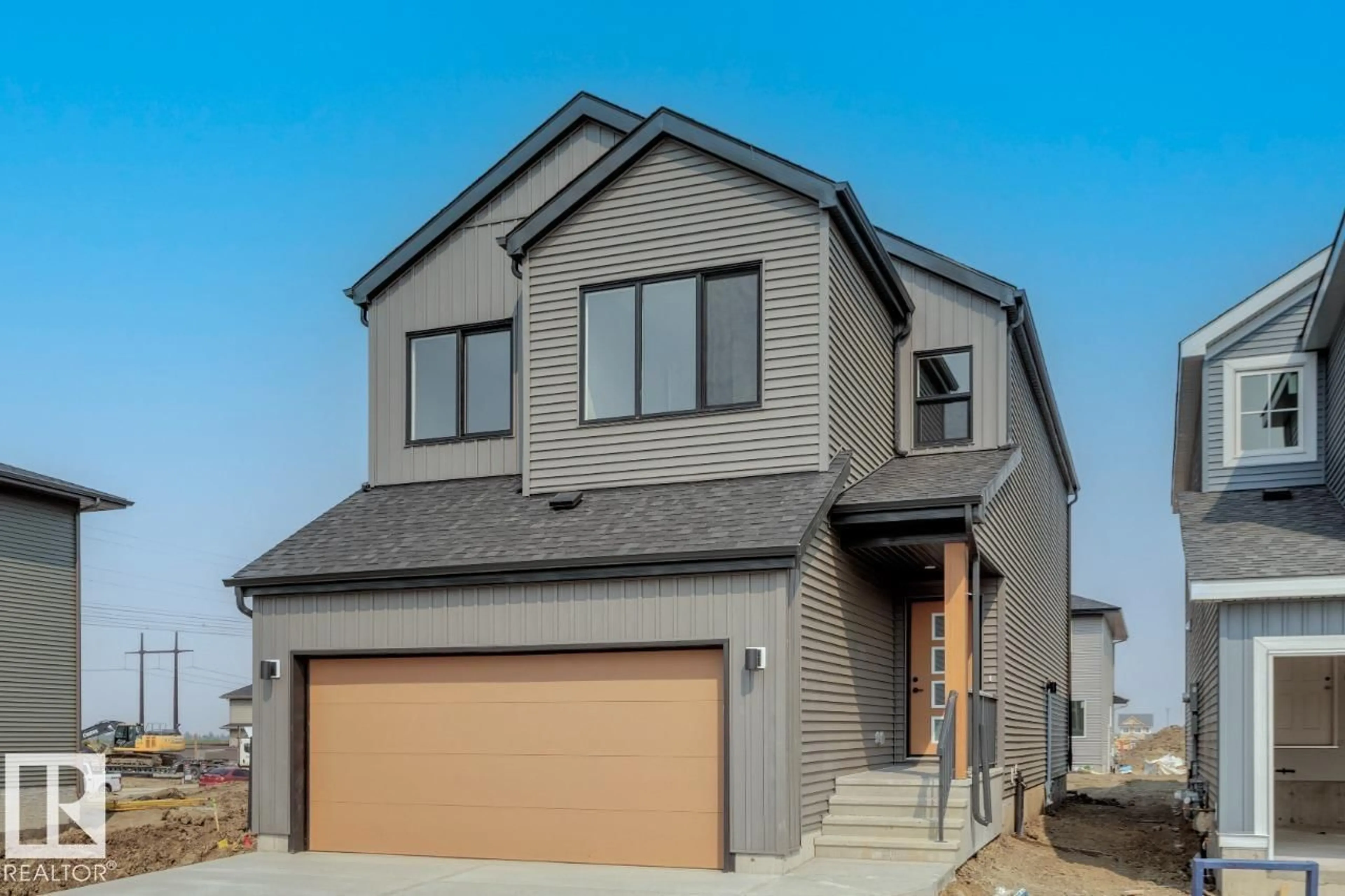 Home with vinyl exterior material, street for NW - 2819 191 ST, Edmonton Alberta T6M3A8
