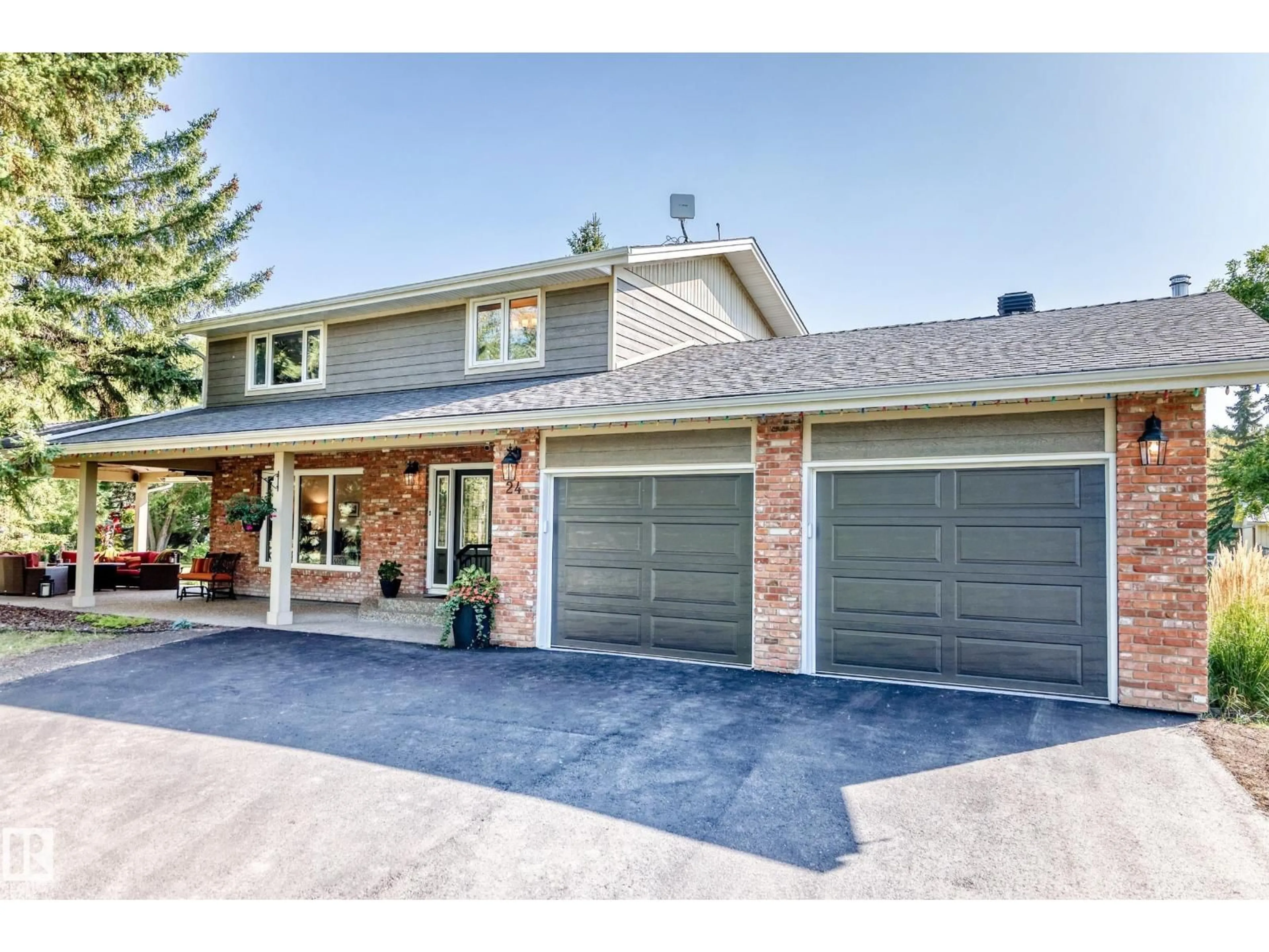 Home with brick exterior material, street for 24 RGE ROAD 261 RGE ROAD, Rural Parkland County Alberta T7Y1B3
