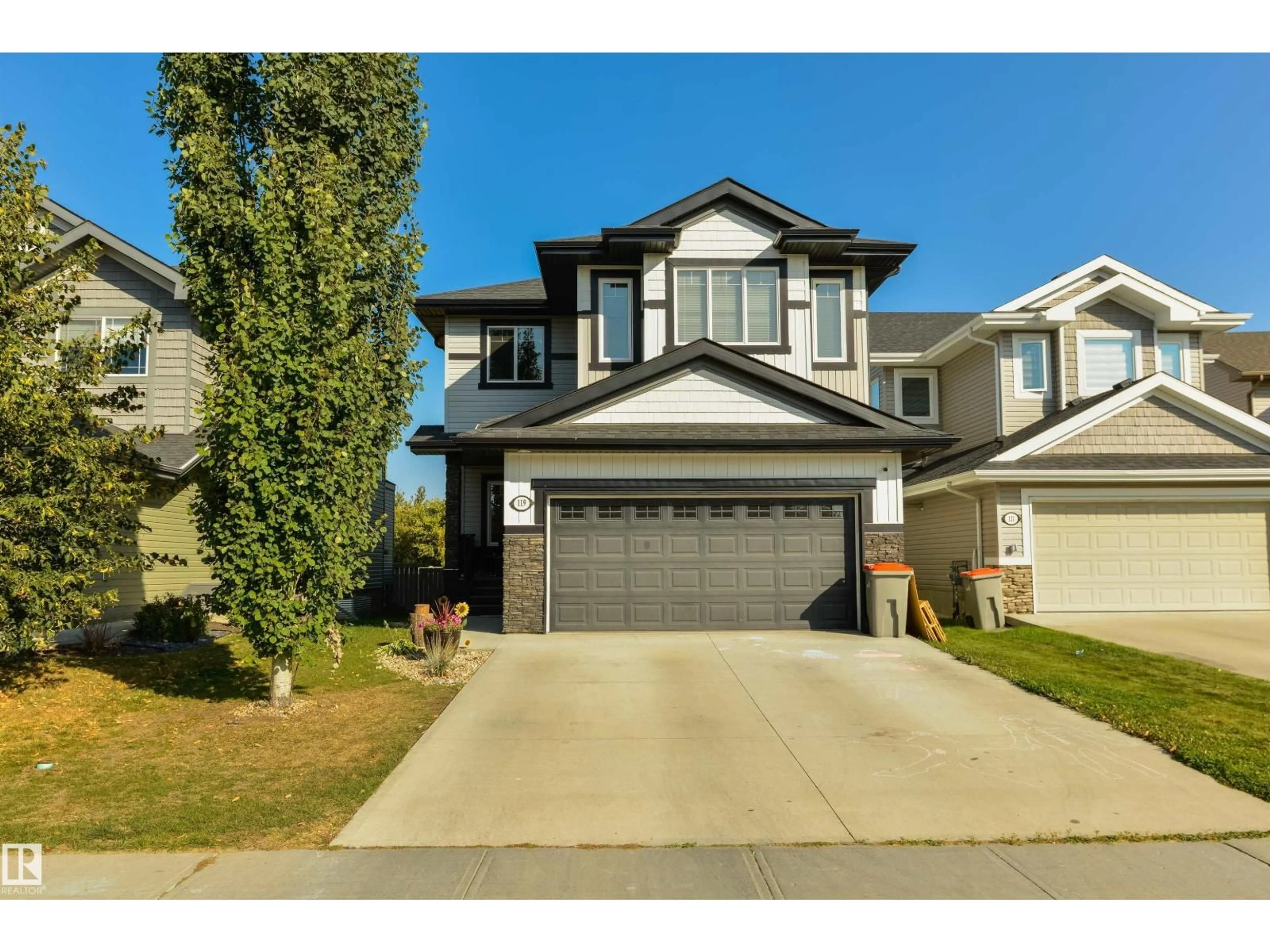 Home with vinyl exterior material, street for 119 BRICKYARD PL, Stony Plain Alberta T7Z0H9