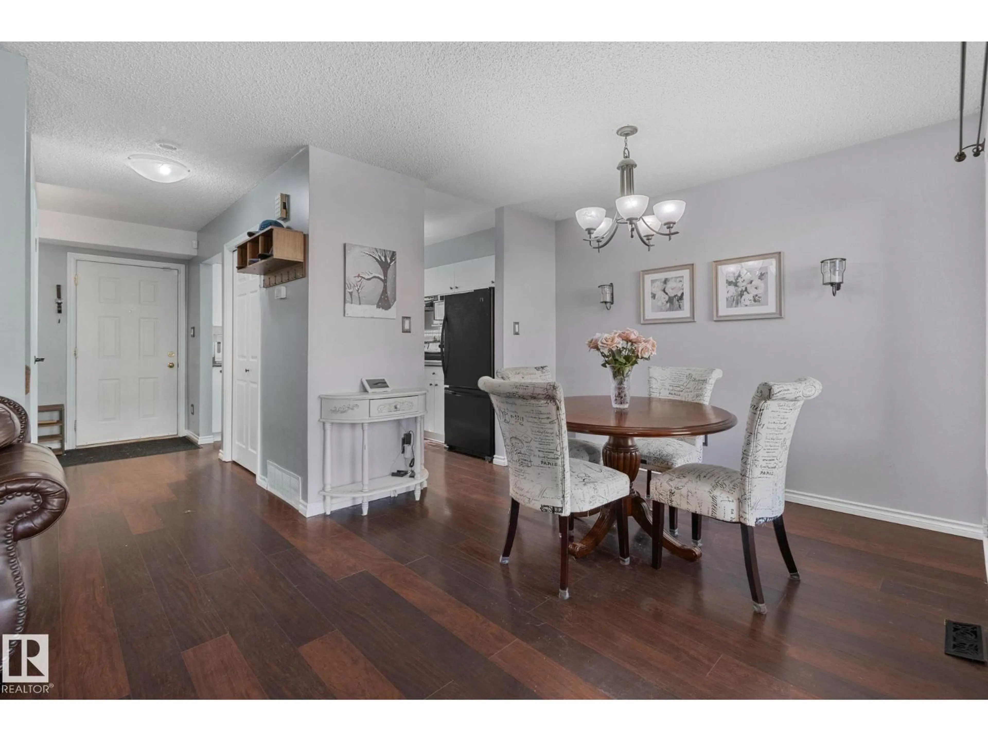 Dining room, wood/laminate floor for #76 - 7604 29 AV, Edmonton Alberta T6K3Z2