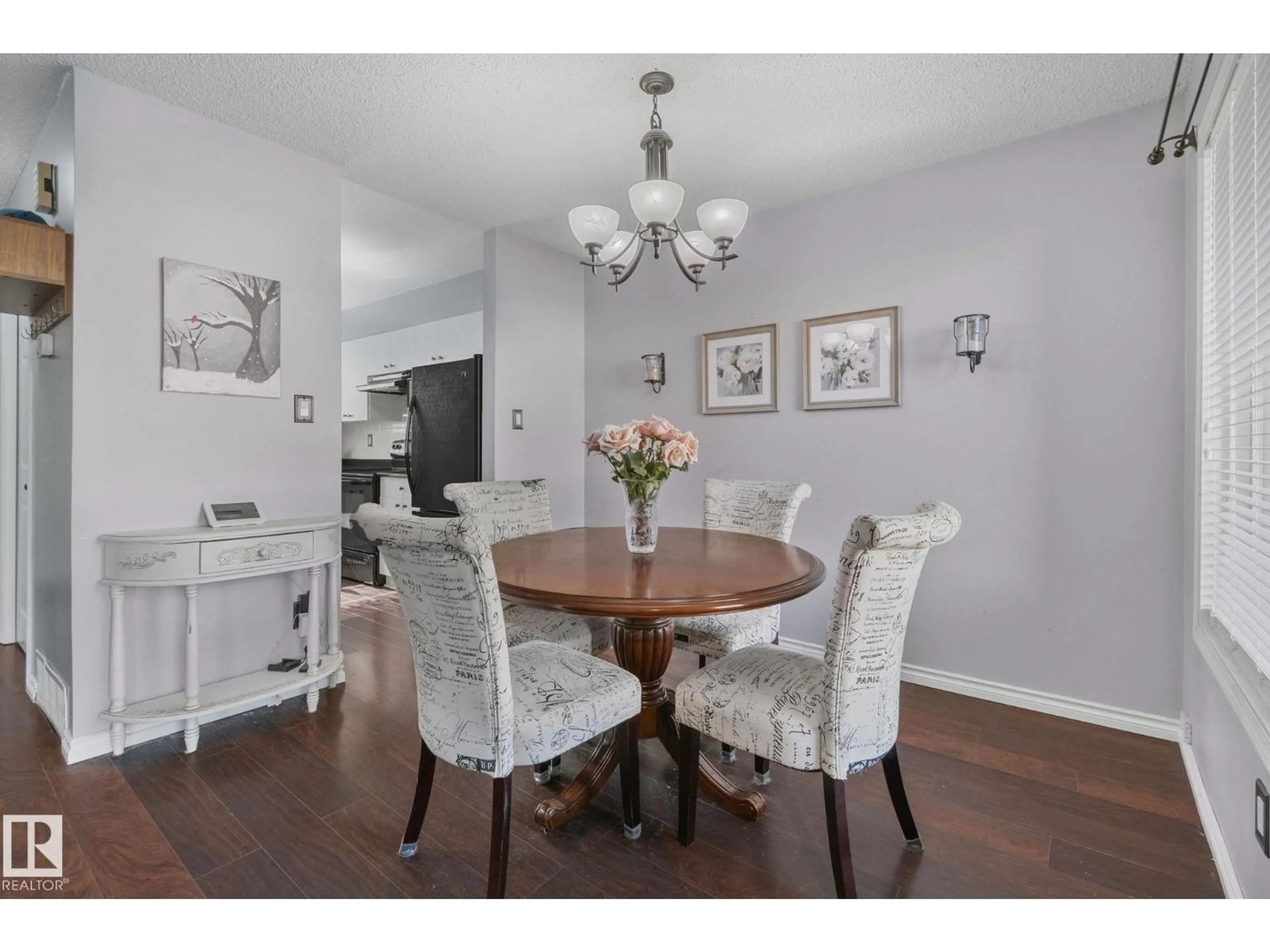 Dining room, wood/laminate floor for #76 - 7604 29 AV, Edmonton Alberta T6K3Z2