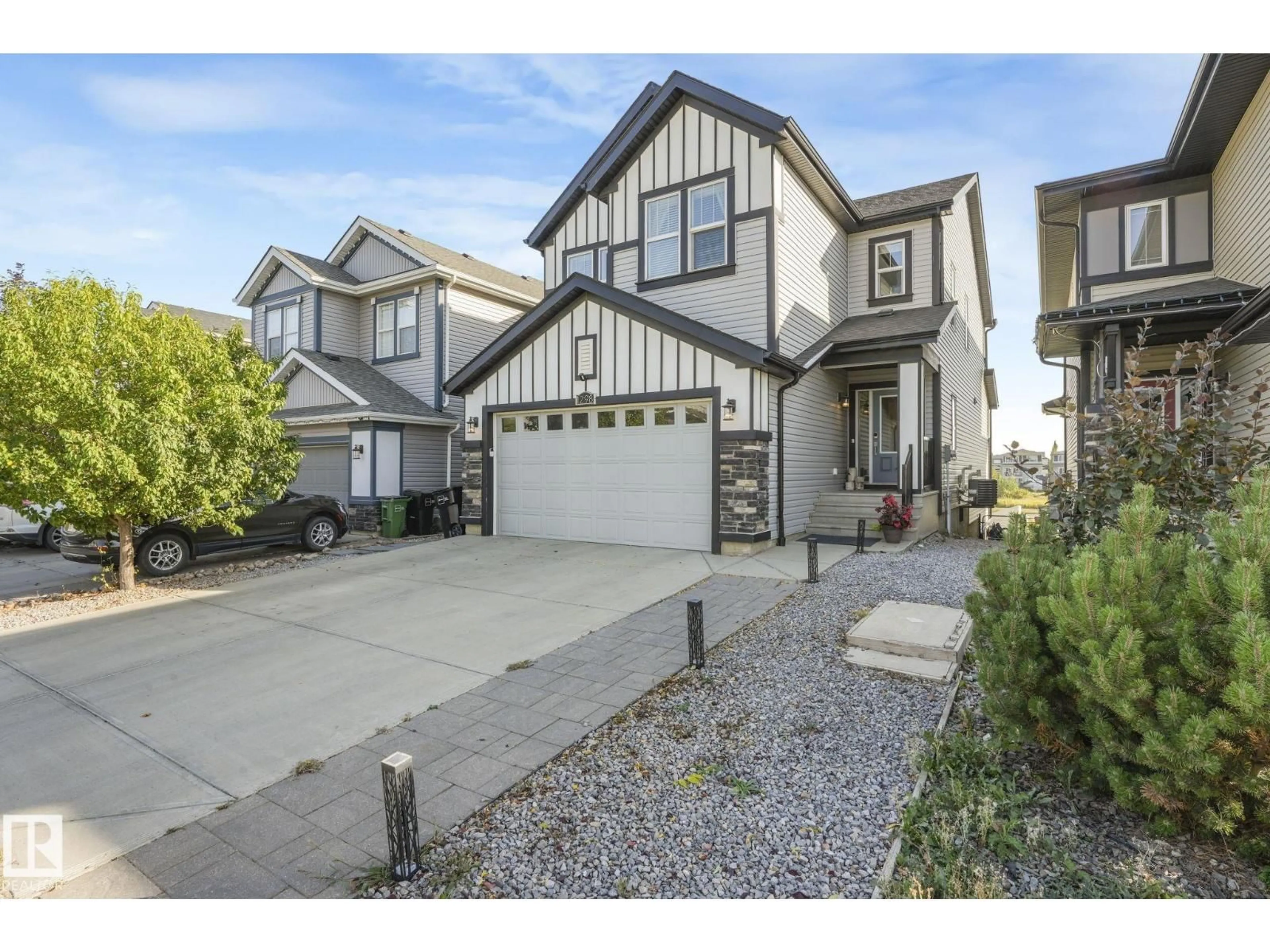 Home with vinyl exterior material, street for 1298 SECORD LANDING LD, Edmonton Alberta T5T4W7