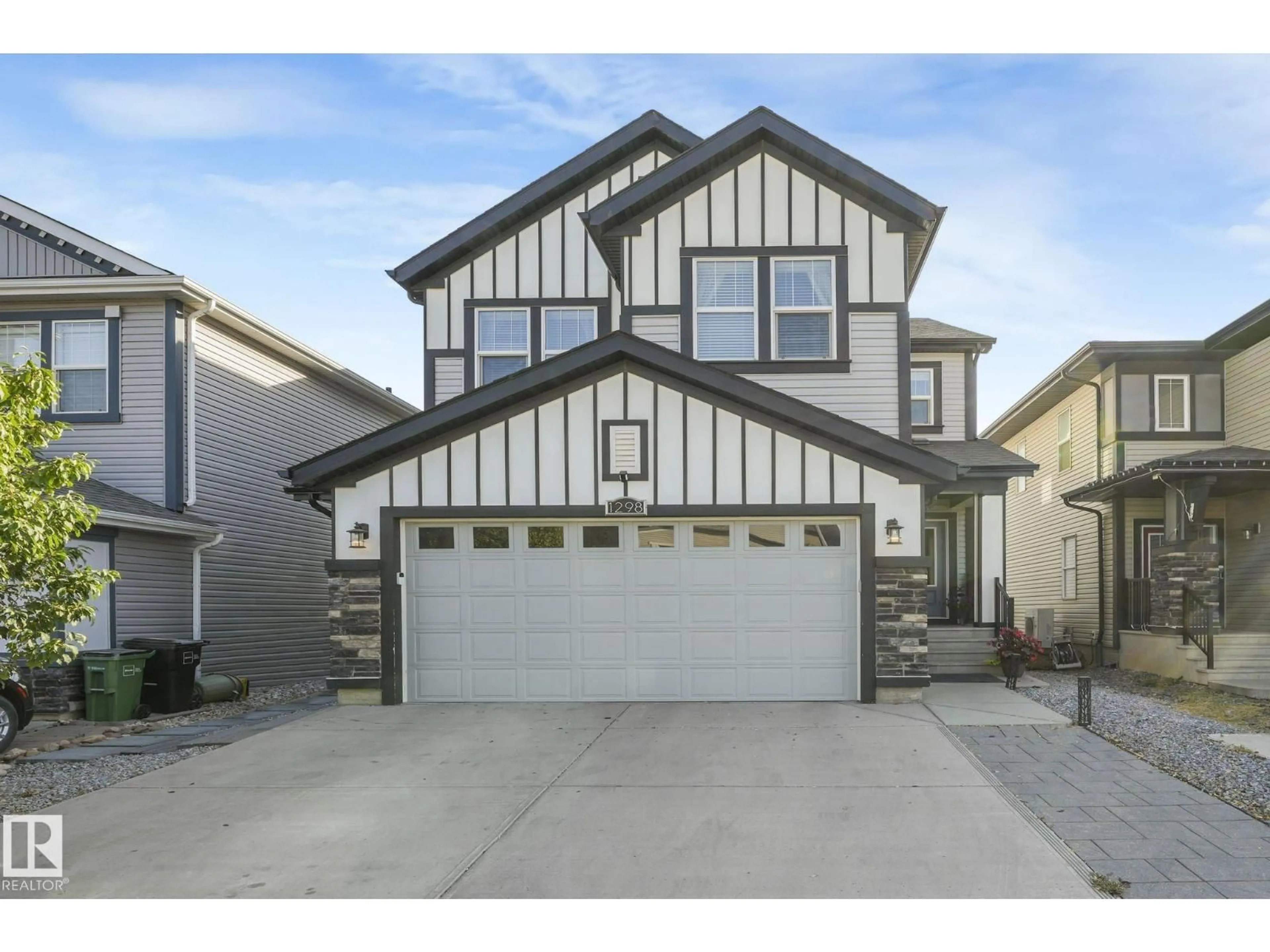Home with vinyl exterior material, street for 1298 SECORD LANDING LD, Edmonton Alberta T5T4W7