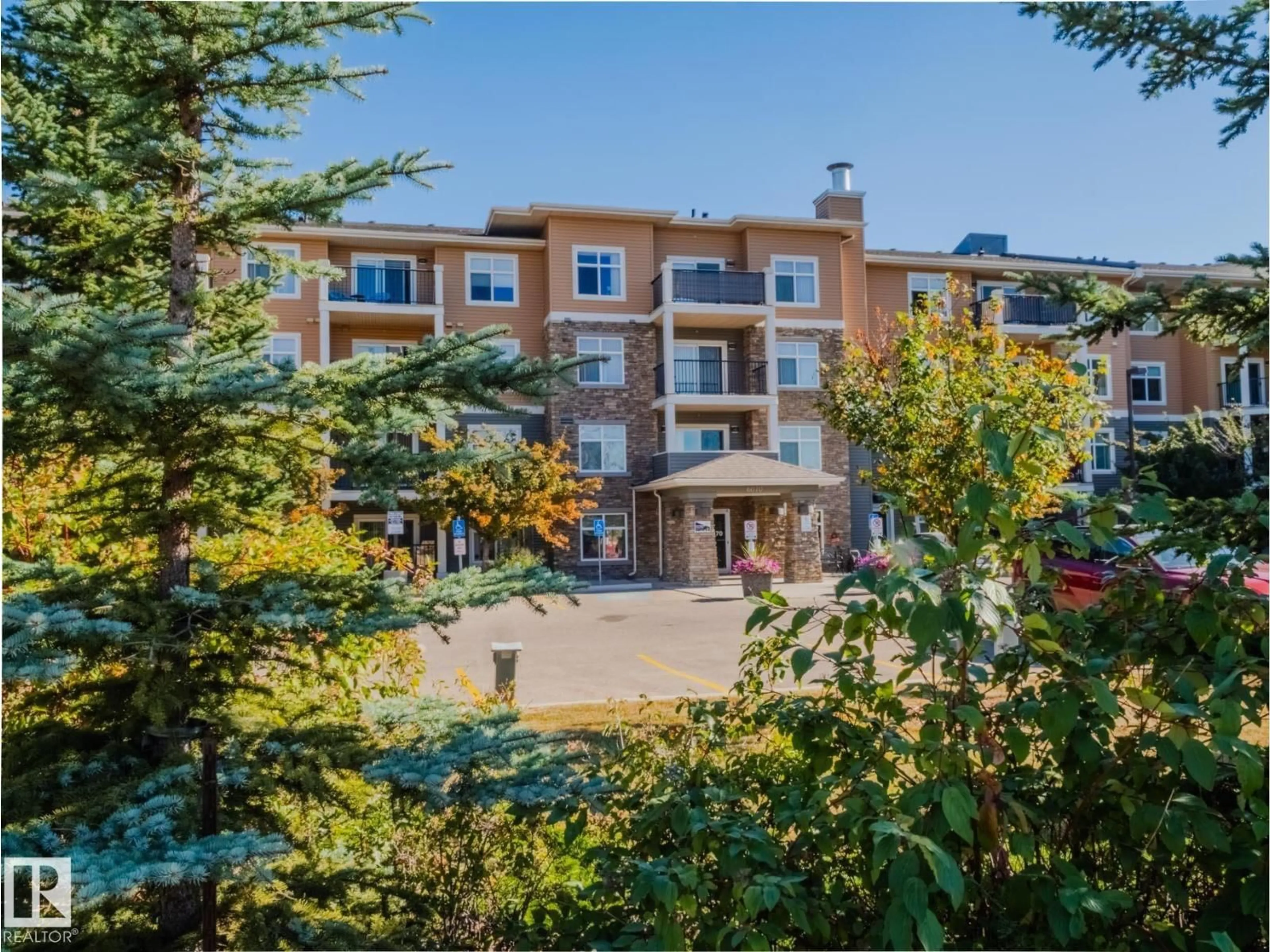 A pic from outside/outdoor area/front of a property/back of a property/a pic from drone, unknown for #409 - 6070 SCHONSEE WY, Edmonton Alberta T5Z0G8