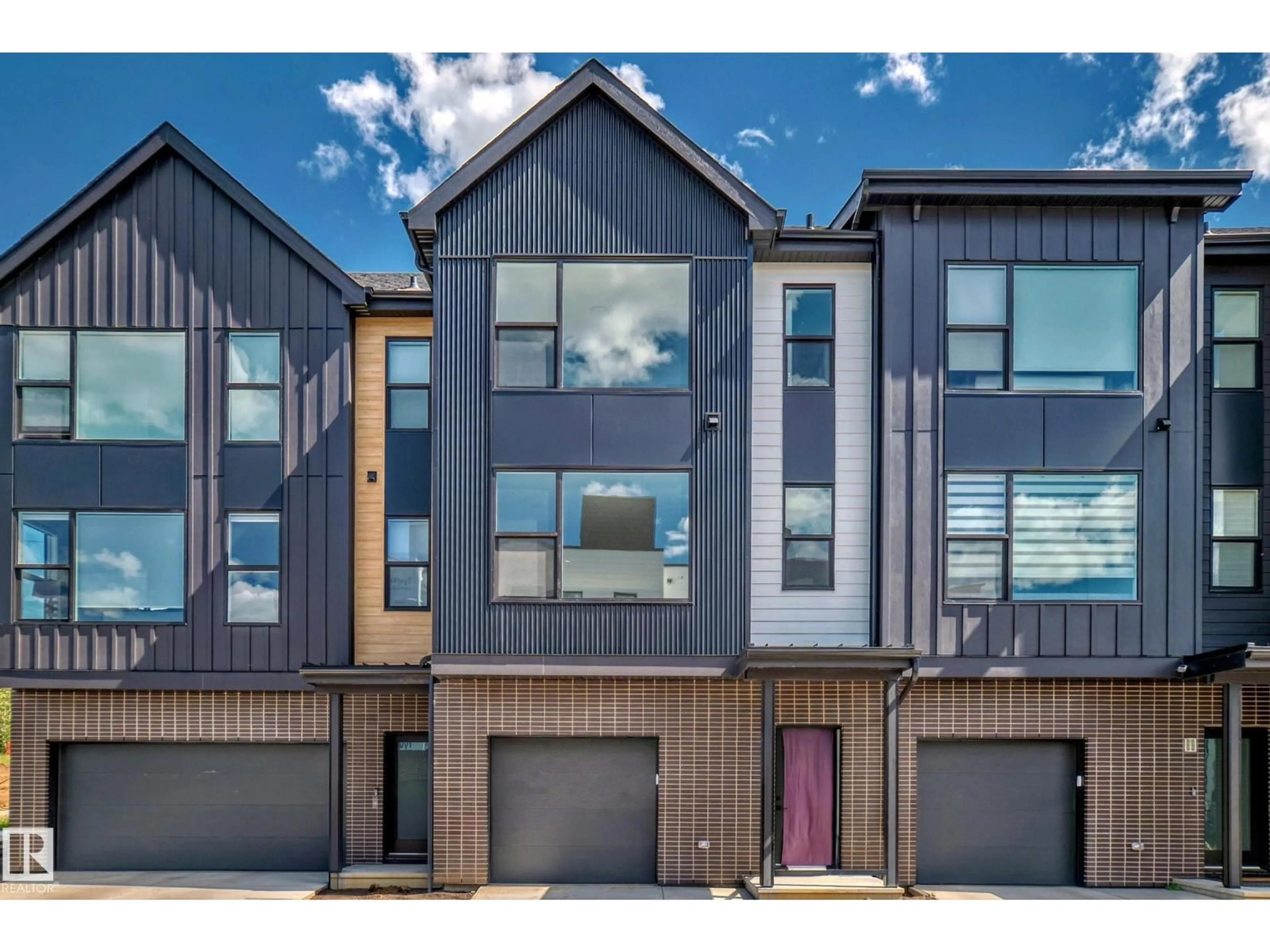 Home with vinyl exterior material, street for 5 - 9 RONDEAU DR, St. Albert Alberta T8N7X8