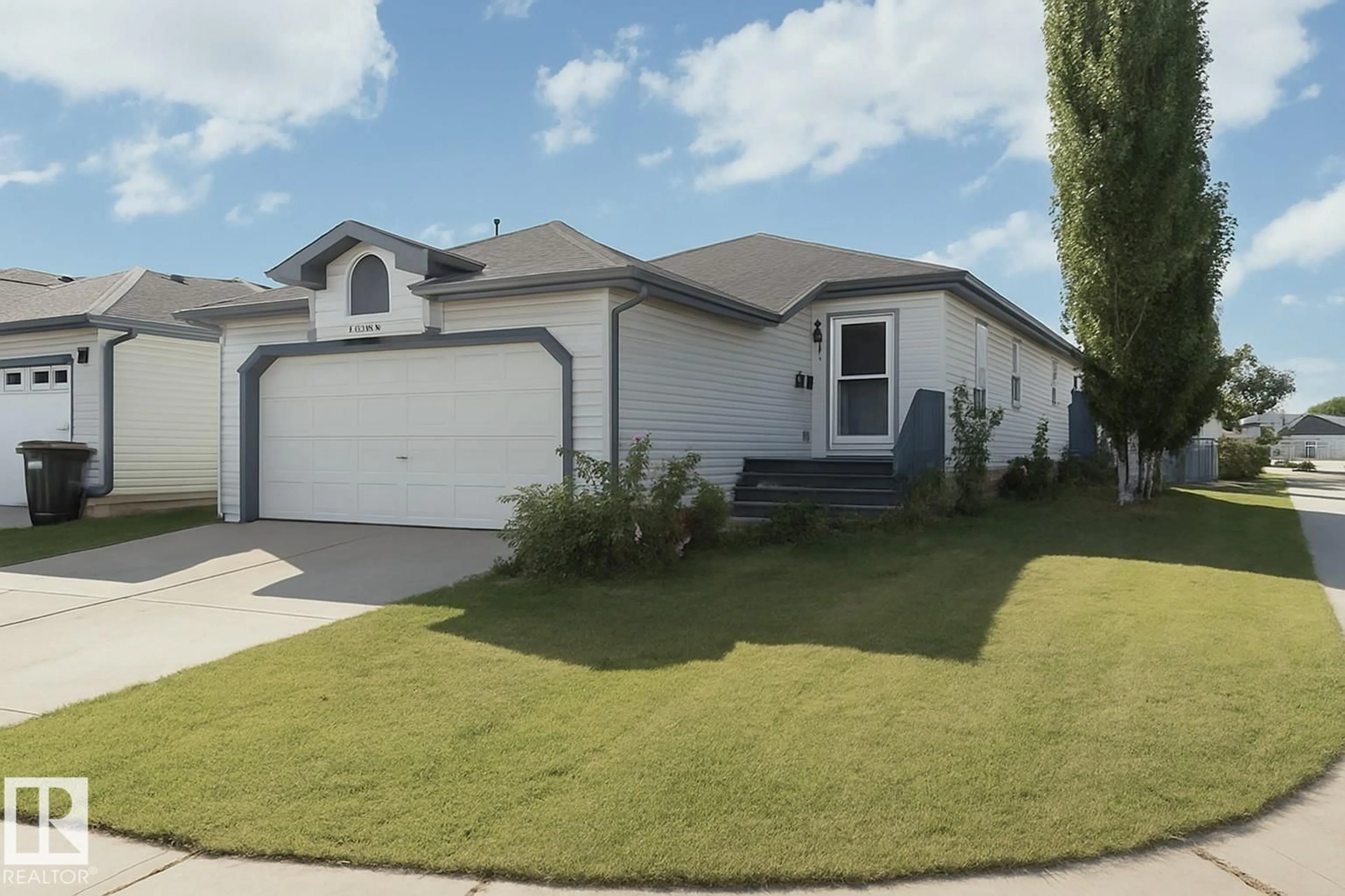 Home with vinyl exterior material, street for 13140 35 ST, Edmonton Alberta T5A5C7