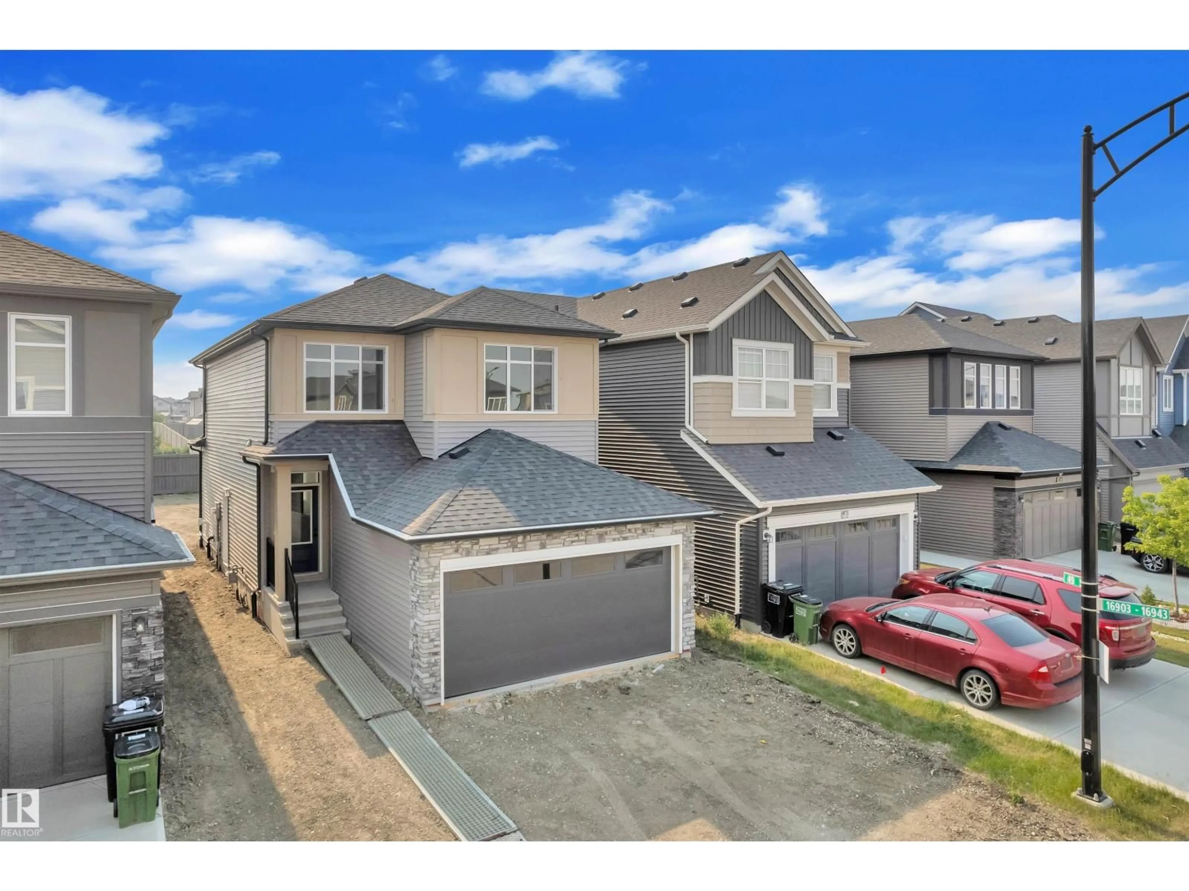 A pic from outside/outdoor area/front of a property/back of a property/a pic from drone, street for 16832 49 ST, Edmonton Alberta T5Y4G9
