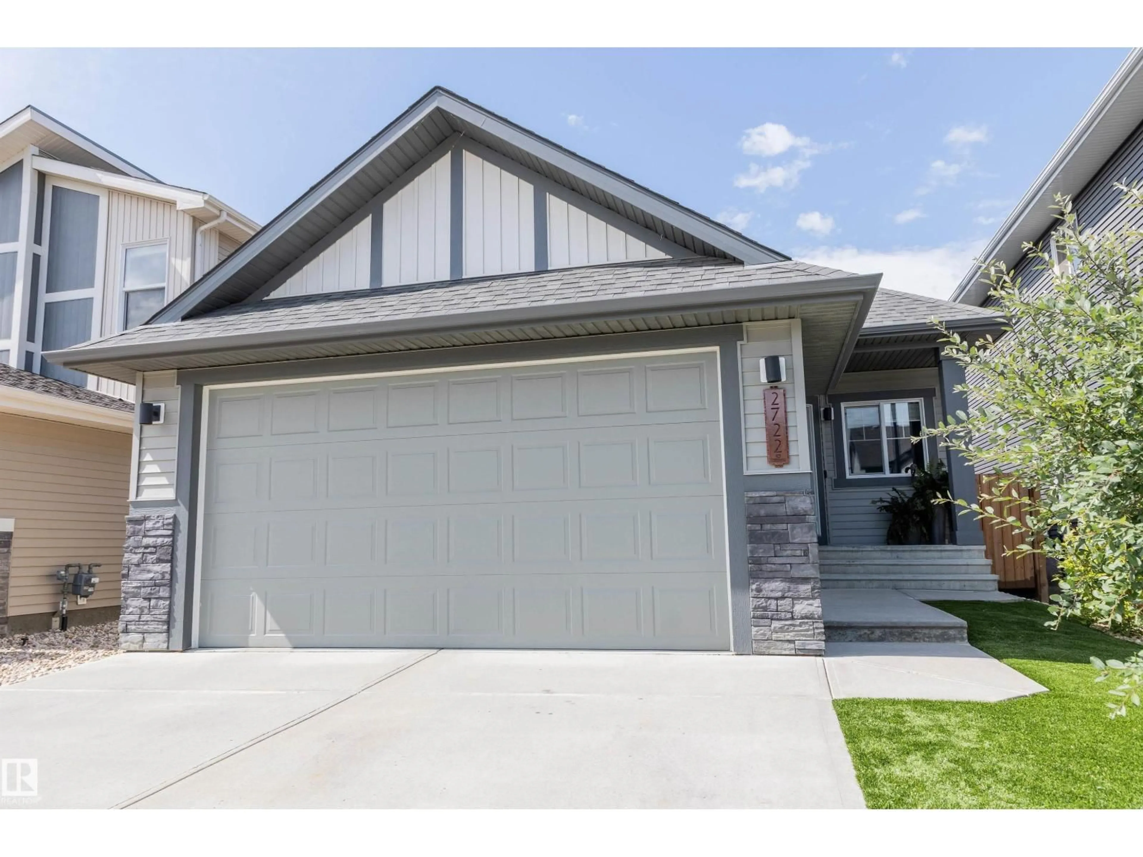 Home with vinyl exterior material, street for SW - 2722 COLLINS CR, Edmonton Alberta T6W3X4