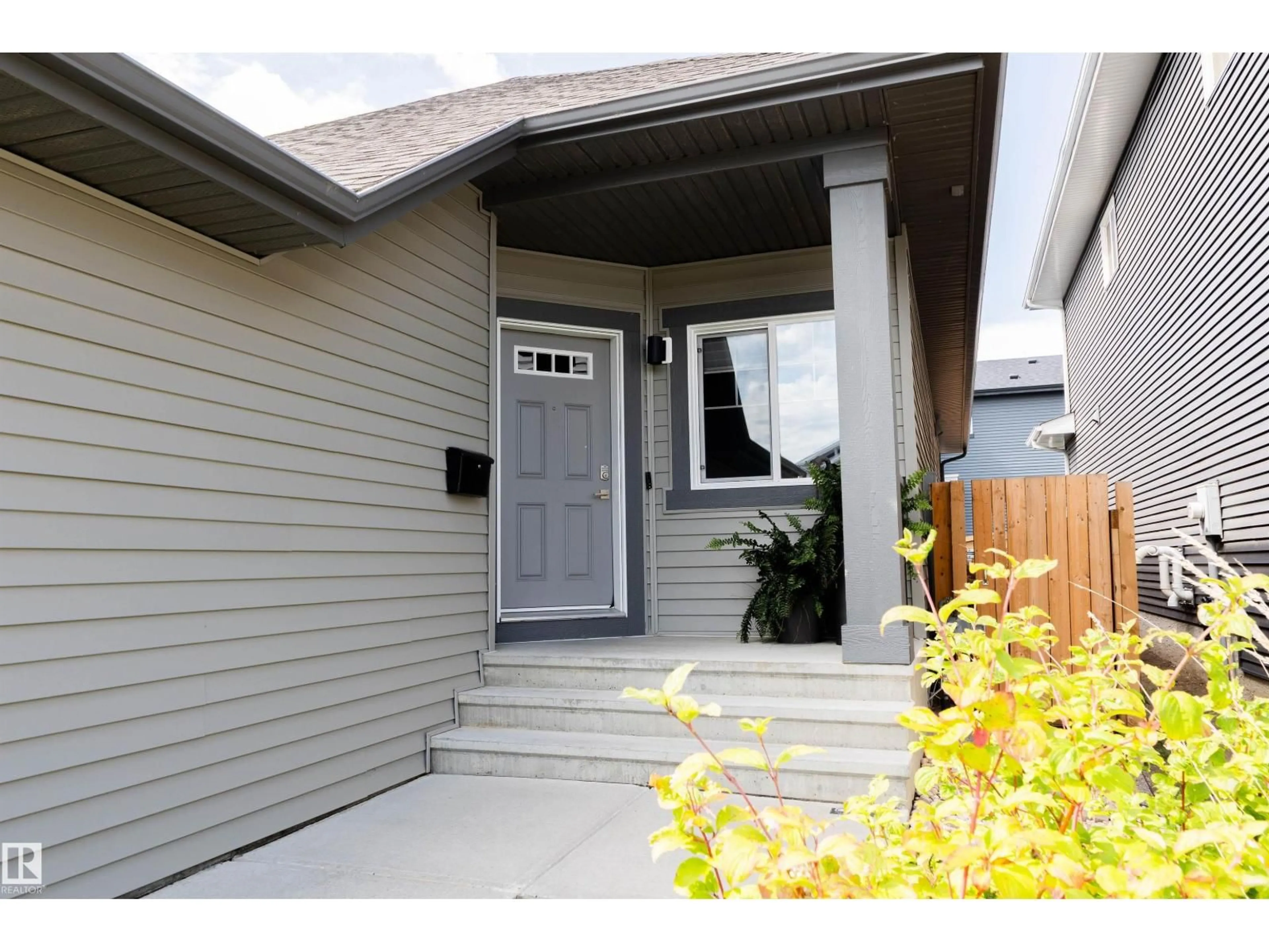 Home with vinyl exterior material, street for SW - 2722 COLLINS CR, Edmonton Alberta T6W3X4