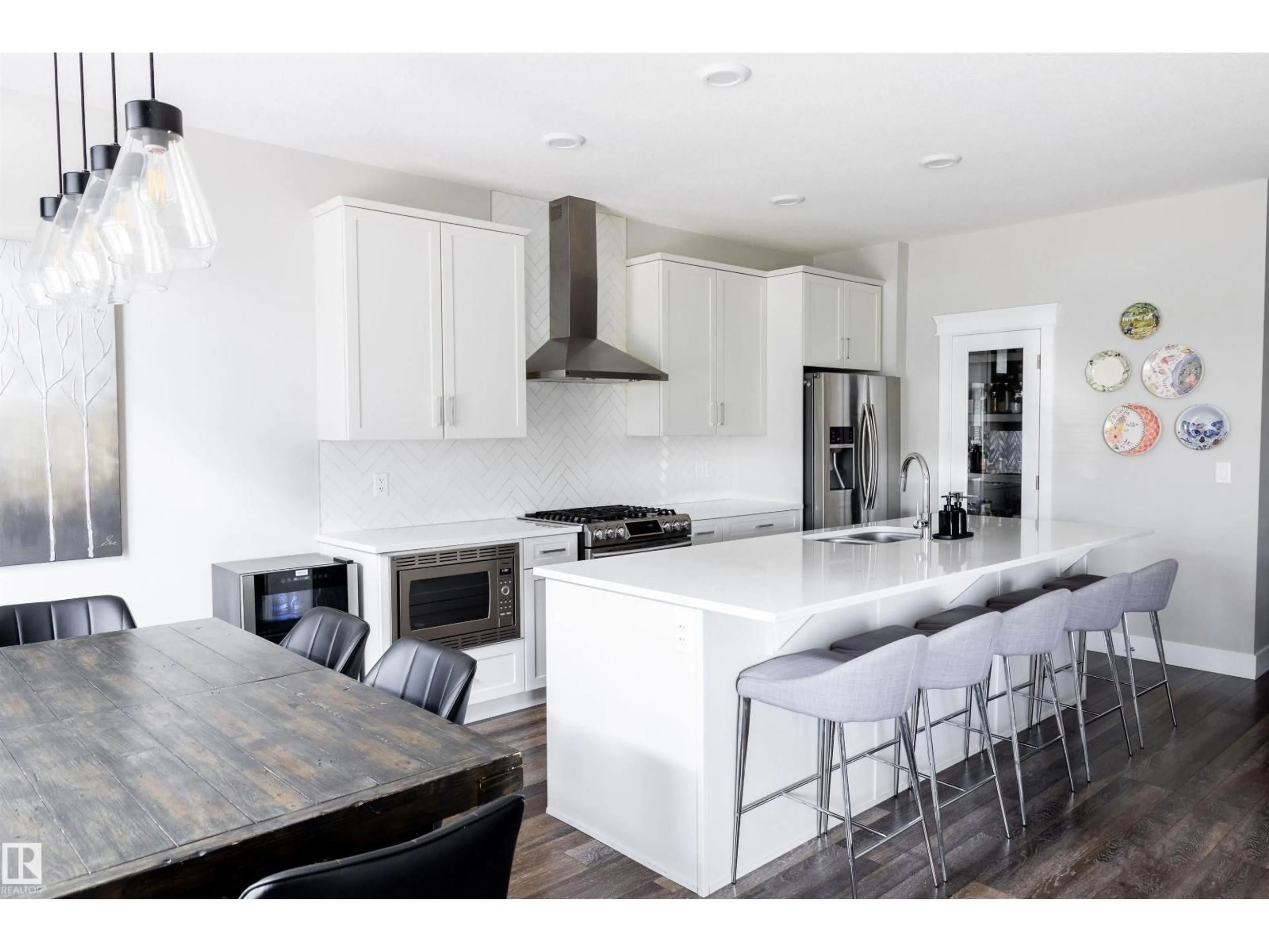Open concept kitchen, wood/laminate floor for SW - 2722 COLLINS CR, Edmonton Alberta T6W3X4