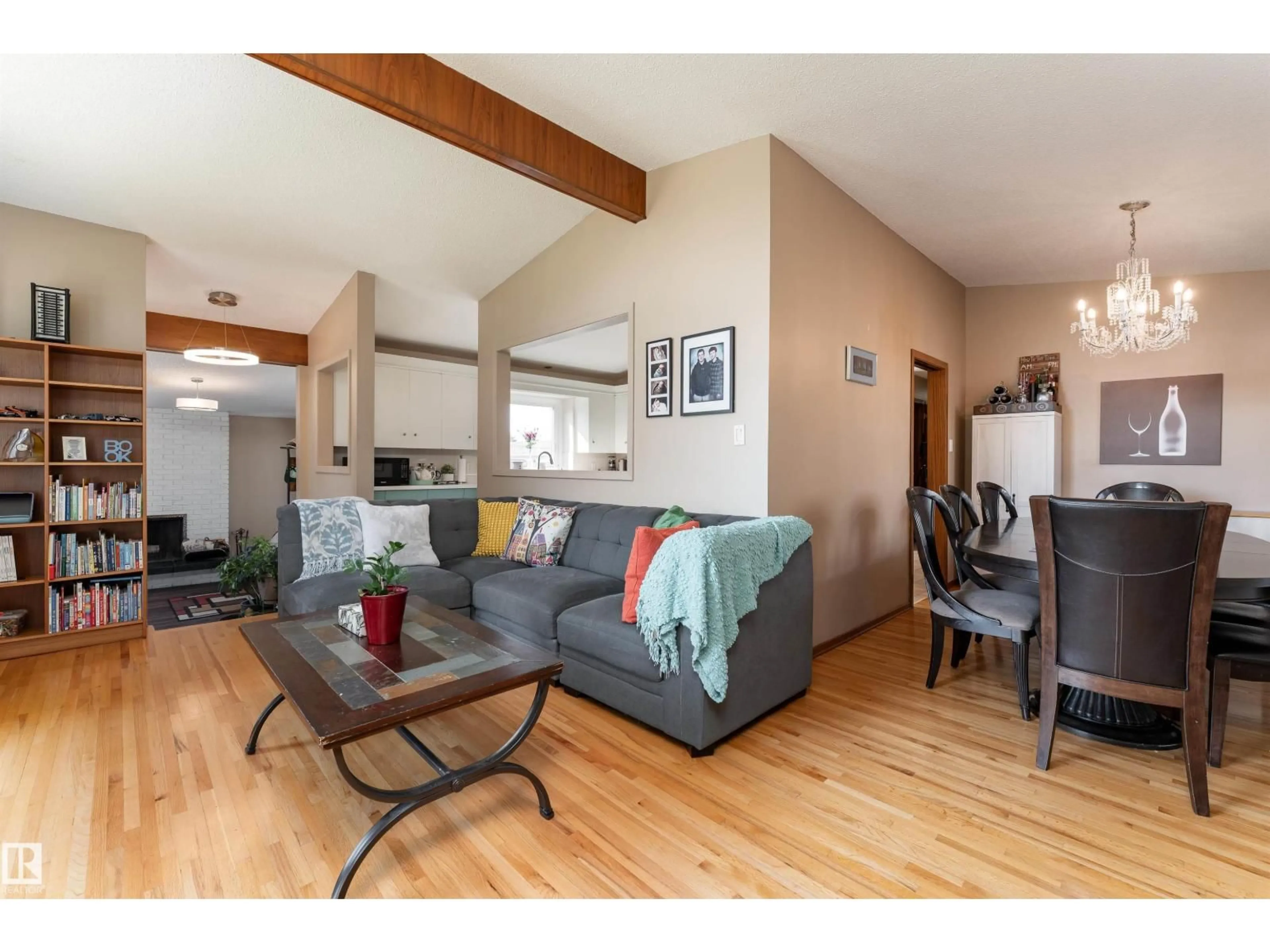 Living room with furniture, wood/laminate floor for 12904 86 ST, Edmonton Alberta T5E3B1