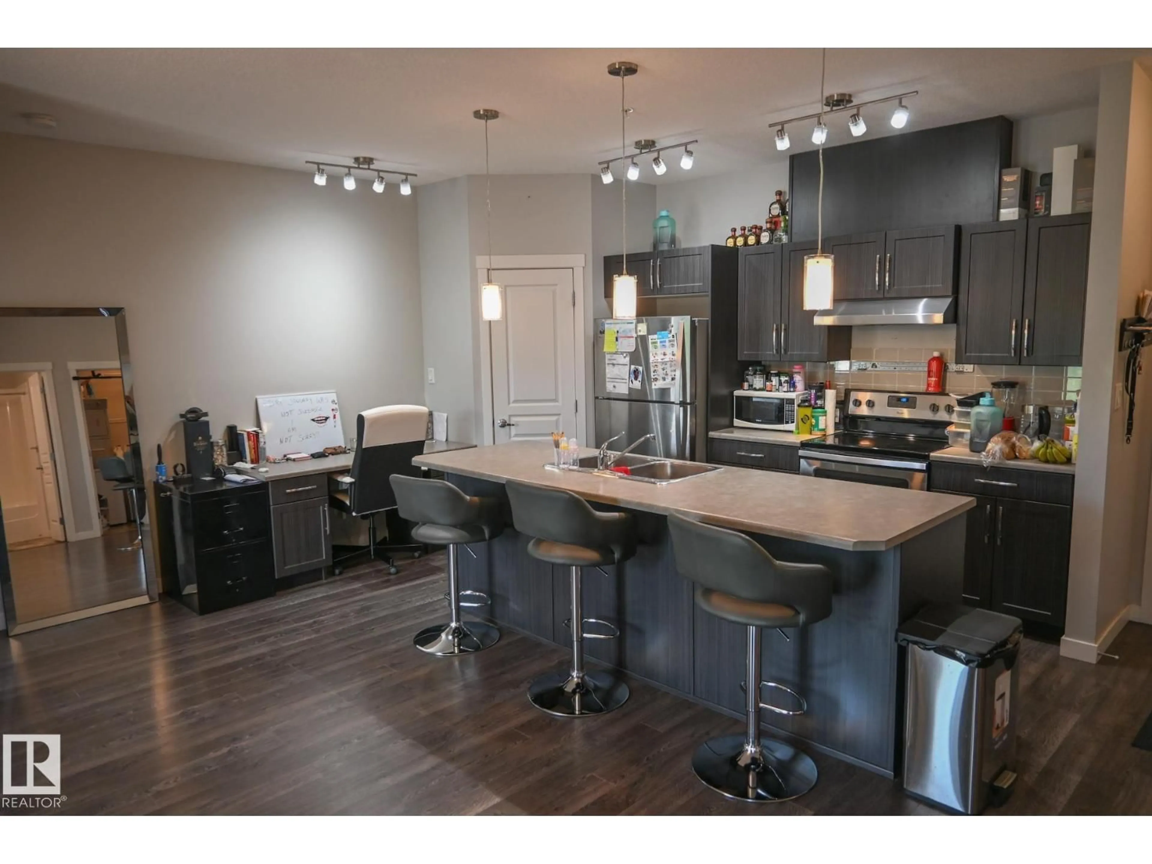 Open concept kitchen, wood/laminate floor for #201 - 812 WELSH DR, Edmonton Alberta T6X1Y7
