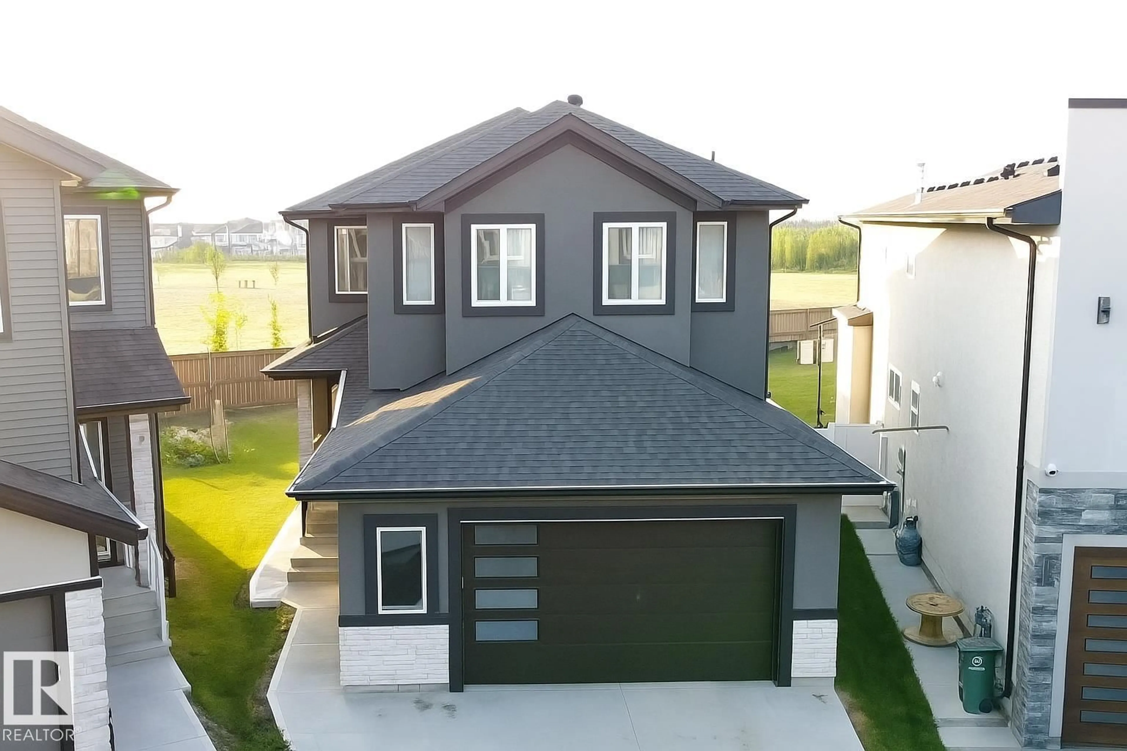 Home with vinyl exterior material, street for 6222 172A AV, Edmonton Alberta T5Y3V5