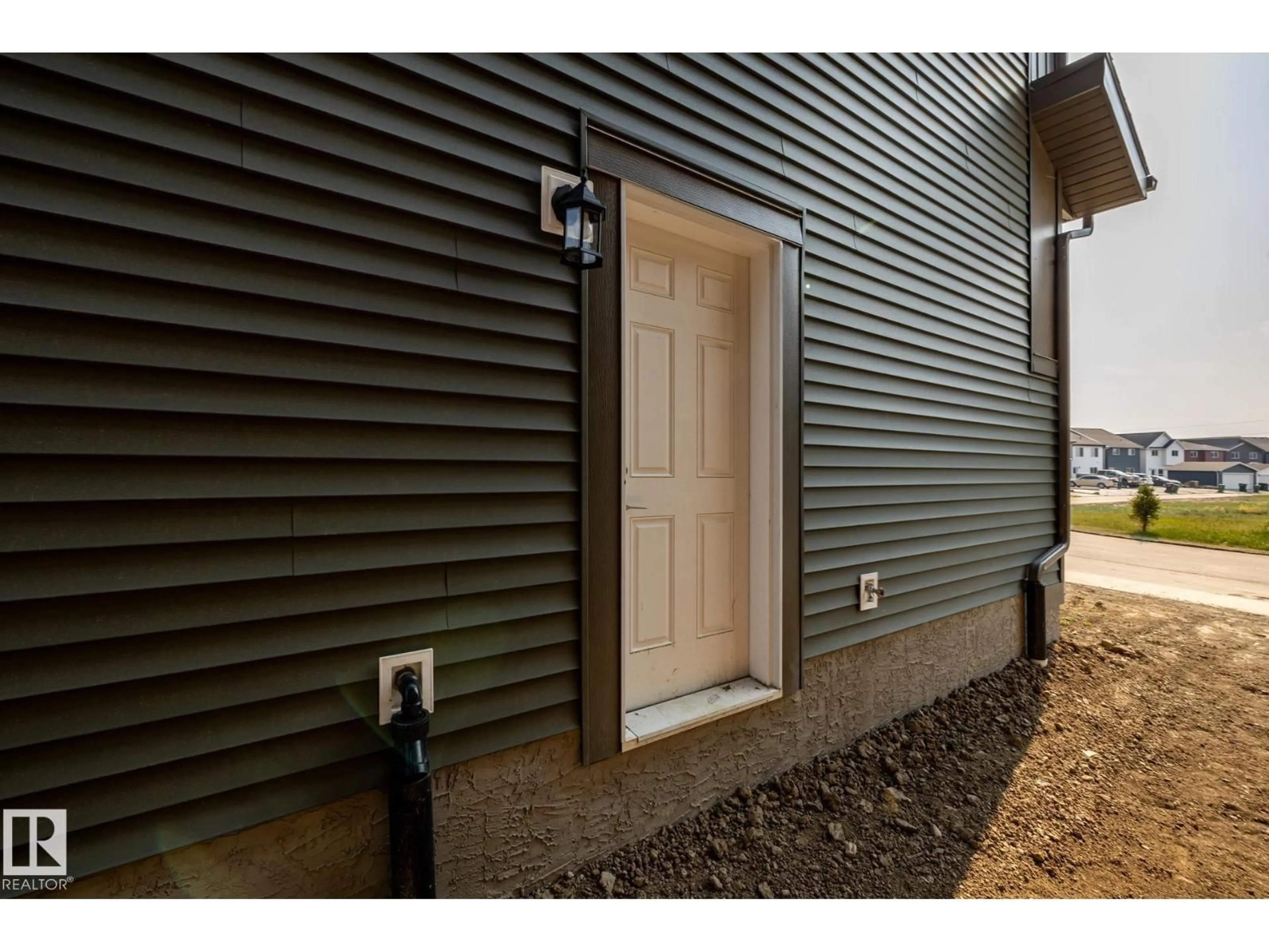 Home with vinyl exterior material, street for 4709 HAWTHORN LN, Edmonton Alberta T6X3C5