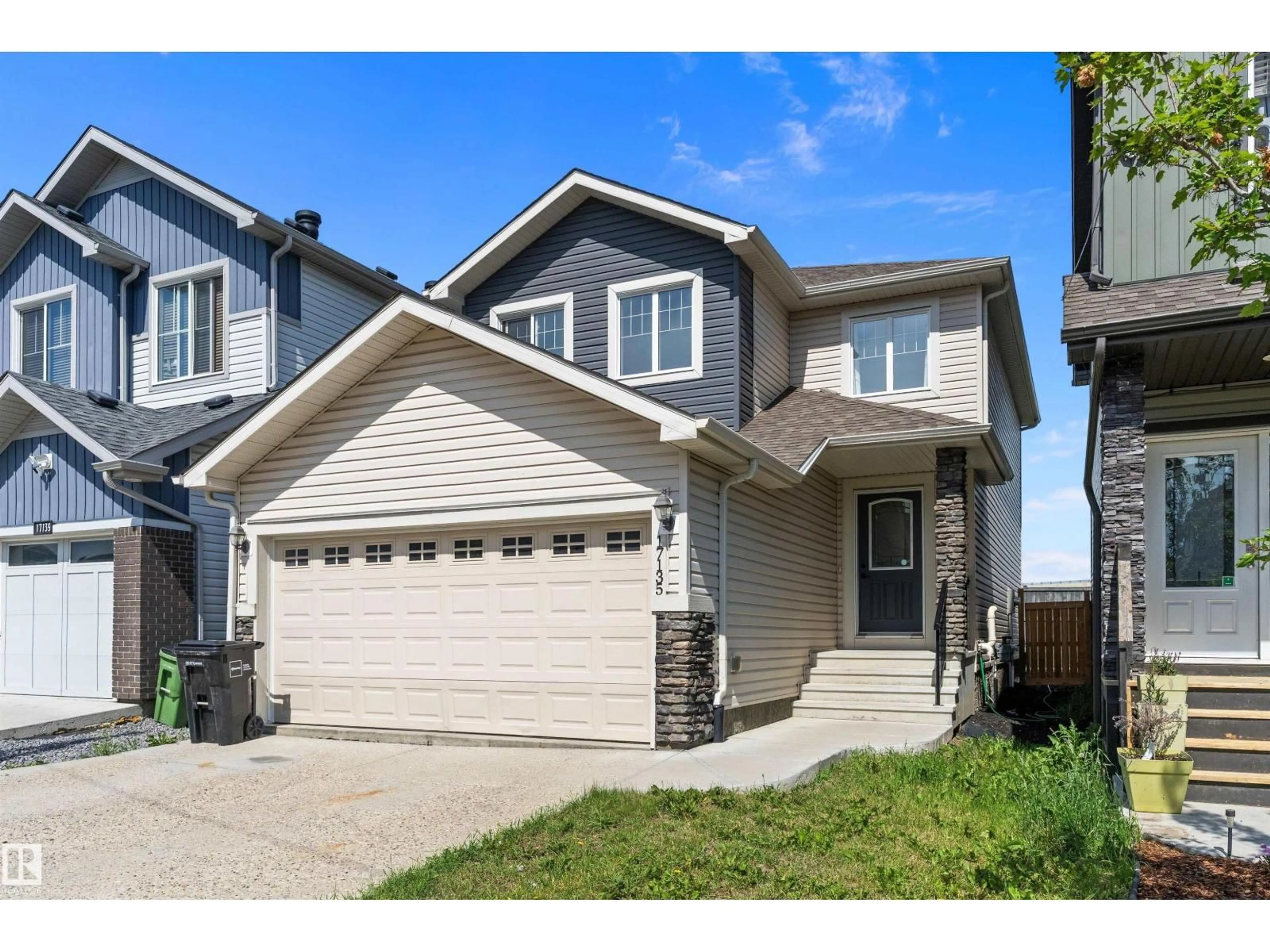 Home with vinyl exterior material, street for 17135 38 ST, Edmonton Alberta T5Z3R7