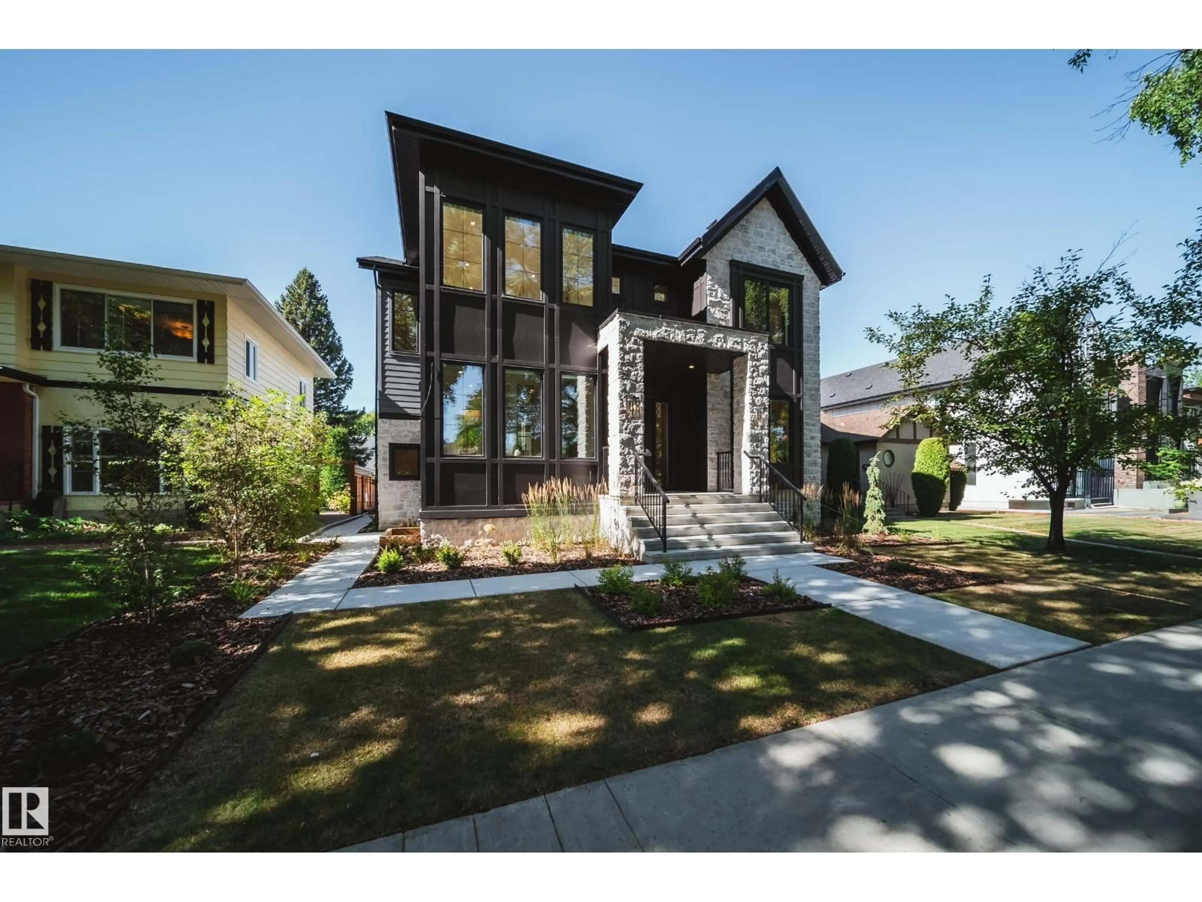 Home with brick exterior material, street for NW - 10522 134 ST, Edmonton Alberta T5N2B5