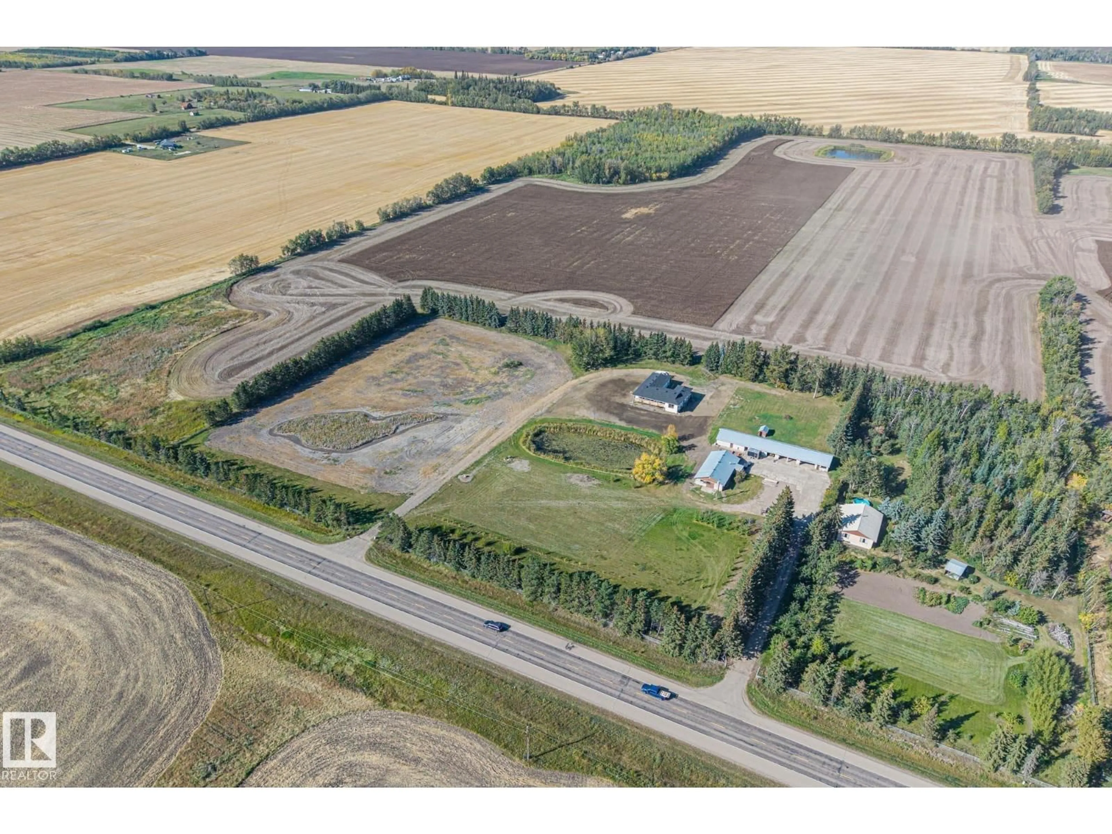 A pic from outside/outdoor area/front of a property/back of a property/a pic from drone, building for 24318 SH 642, Rural Sturgeon County Alberta T0A0K5