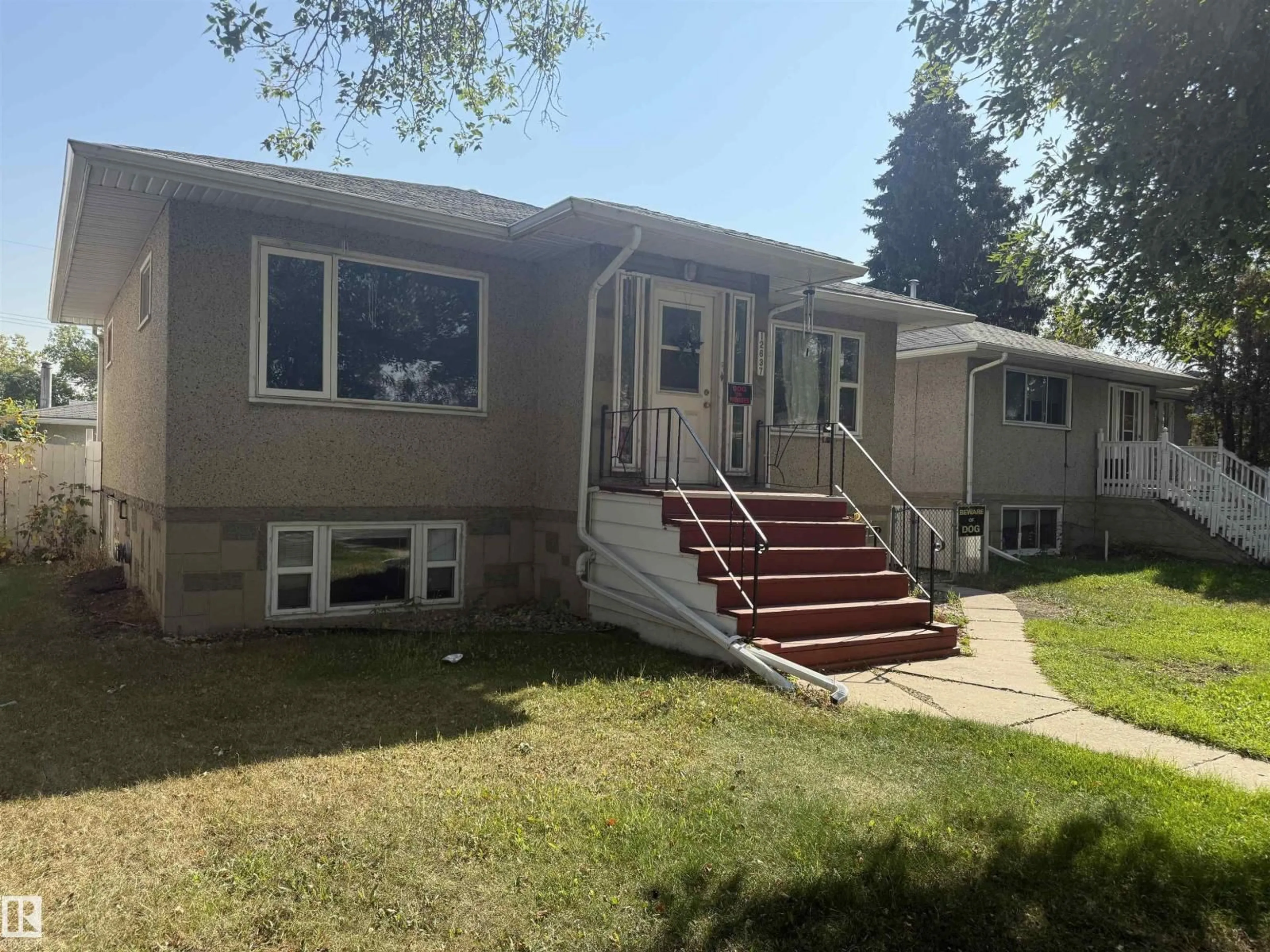 Home with vinyl exterior material, street for 12637 70 ST, Edmonton Alberta T6L3R6