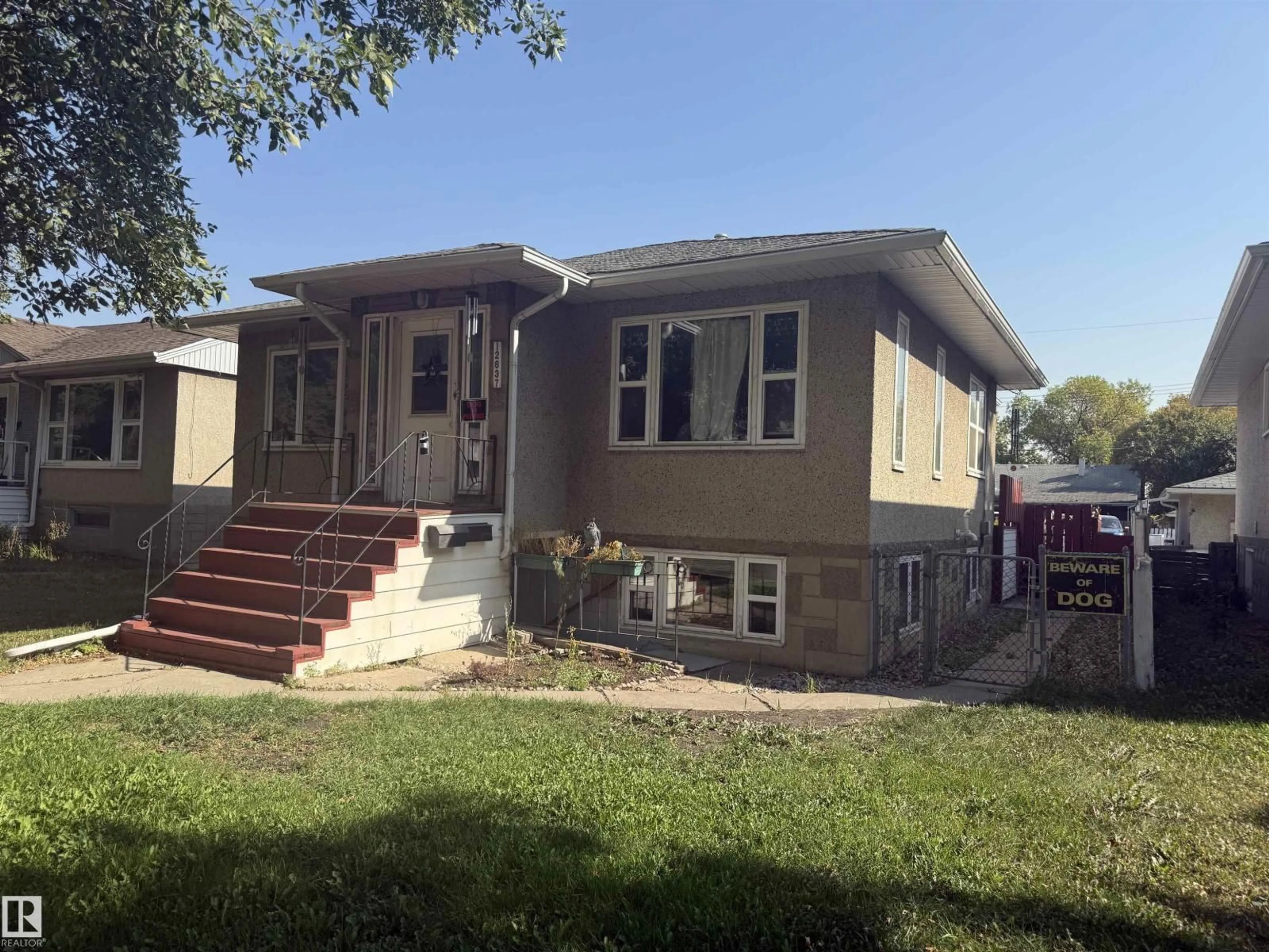 Home with vinyl exterior material, street for 12637 70 ST, Edmonton Alberta T6L3R6