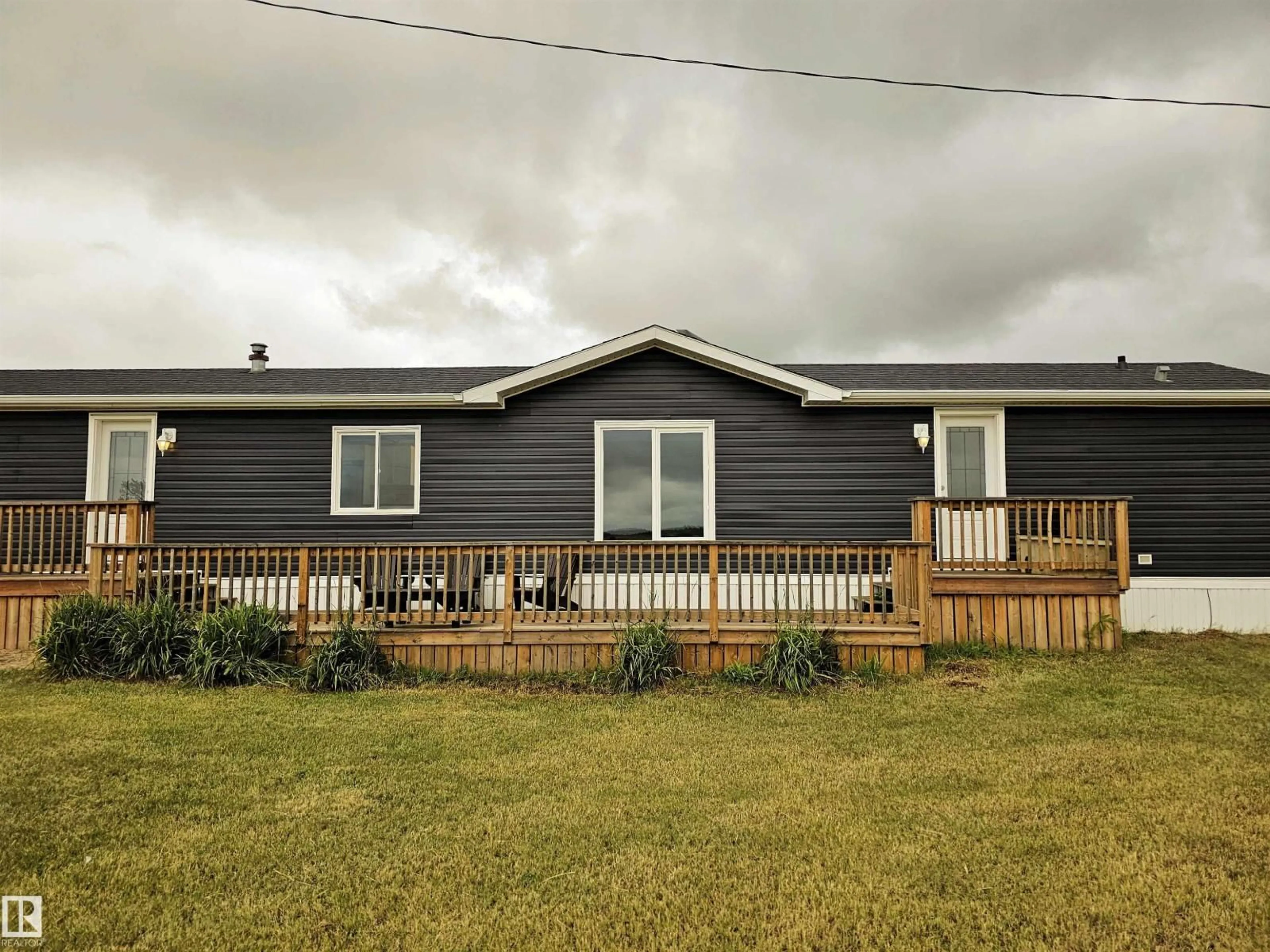A pic from outside/outdoor area/front of a property/back of a property/a pic from drone, unknown for 42 - 23422 TWP ROAD 582, Rural Sturgeon County Alberta T0G1L2