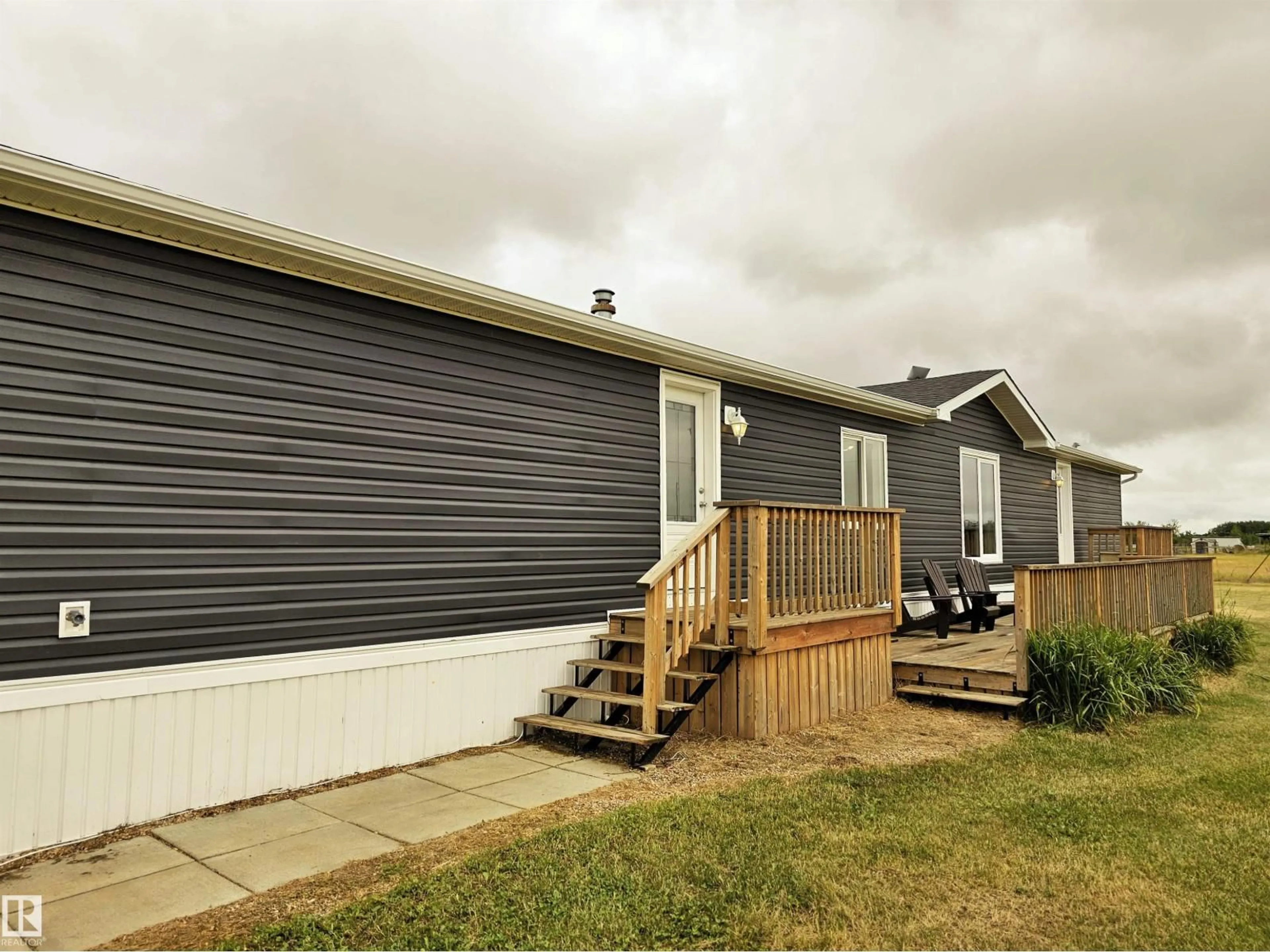 Home with vinyl exterior material, street for 42 - 23422 TWP ROAD 582, Rural Sturgeon County Alberta T0G1L2
