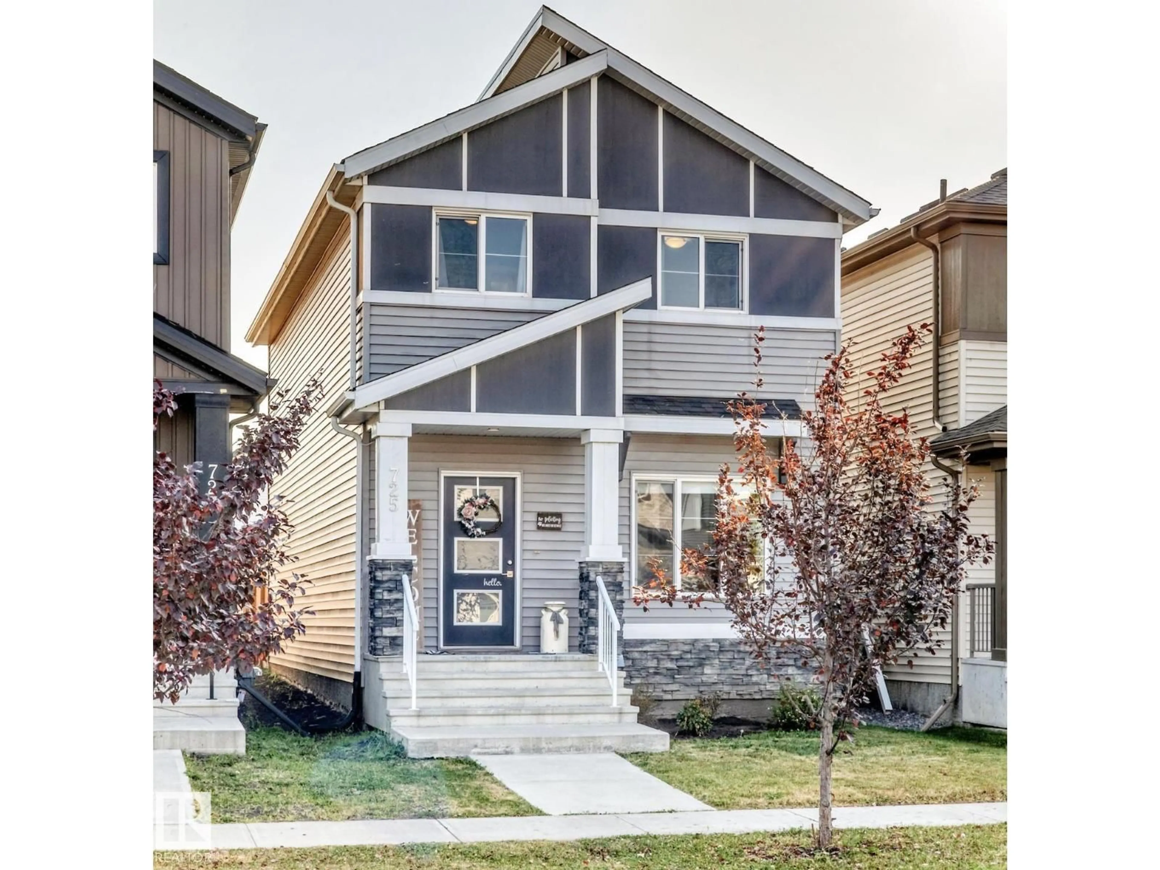 Home with vinyl exterior material, street for 725 BERG LO, Leduc Alberta T9E1G9