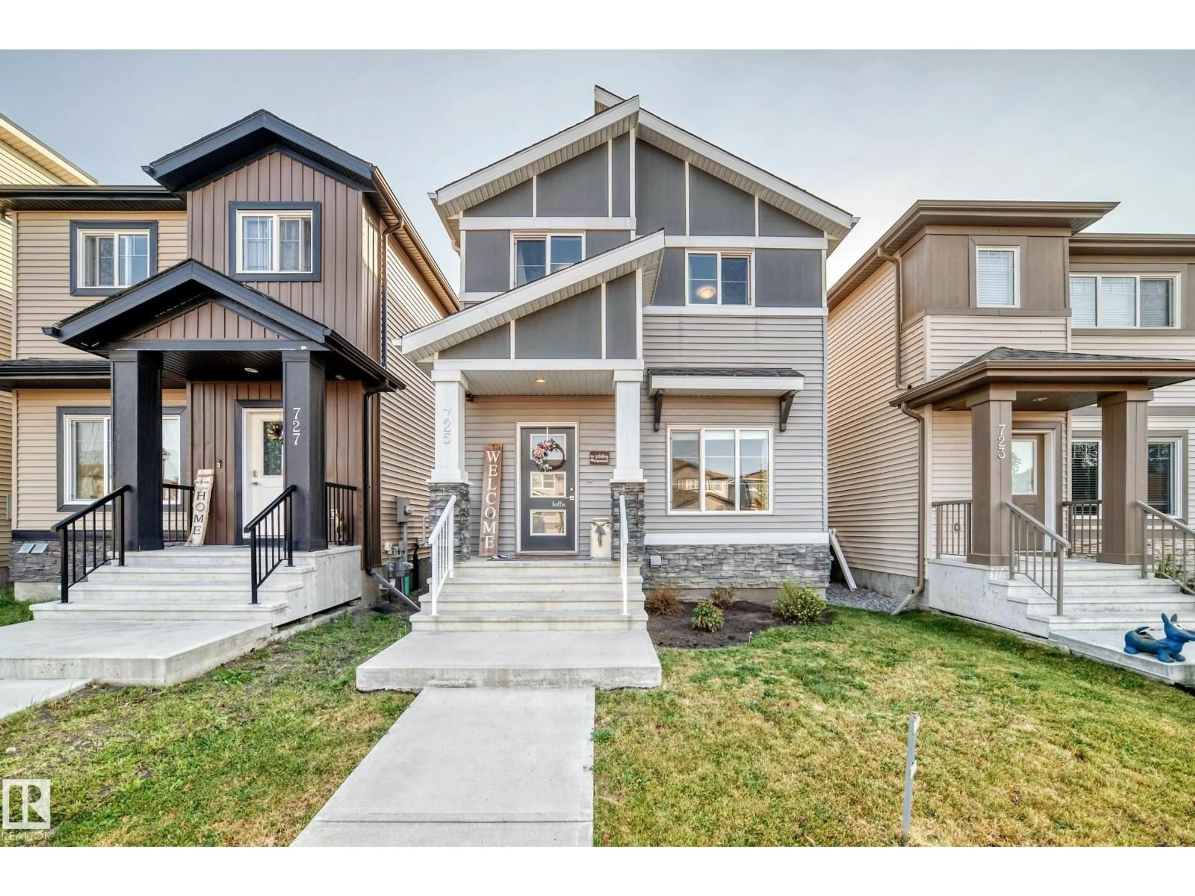 Home with vinyl exterior material, street for 725 BERG LO, Leduc Alberta T9E1G9