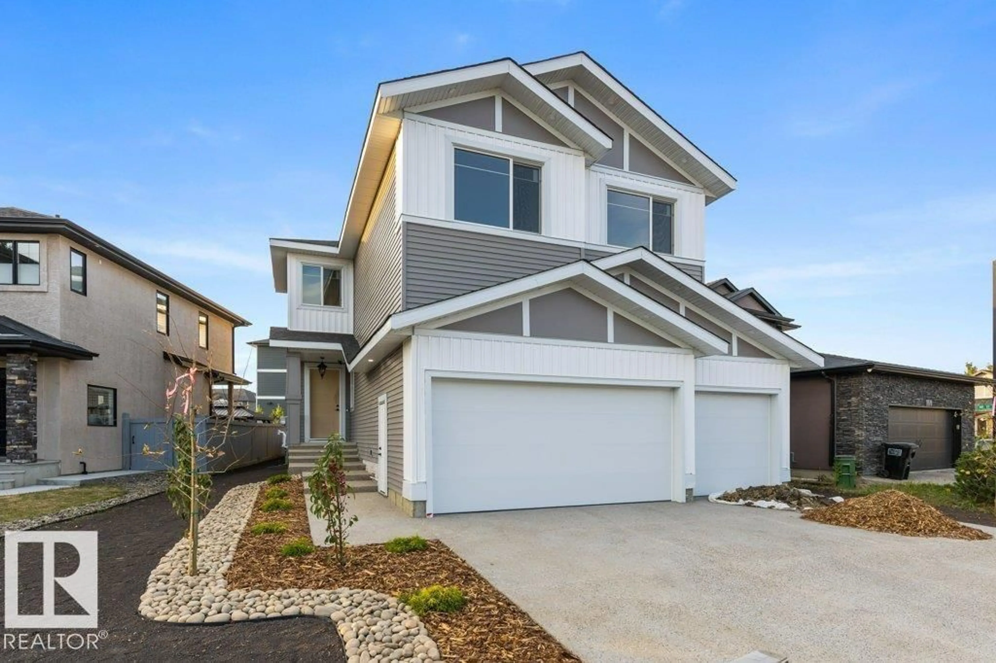 Home with vinyl exterior material, street for 11010 174A AV, Edmonton Alberta T5X0C5