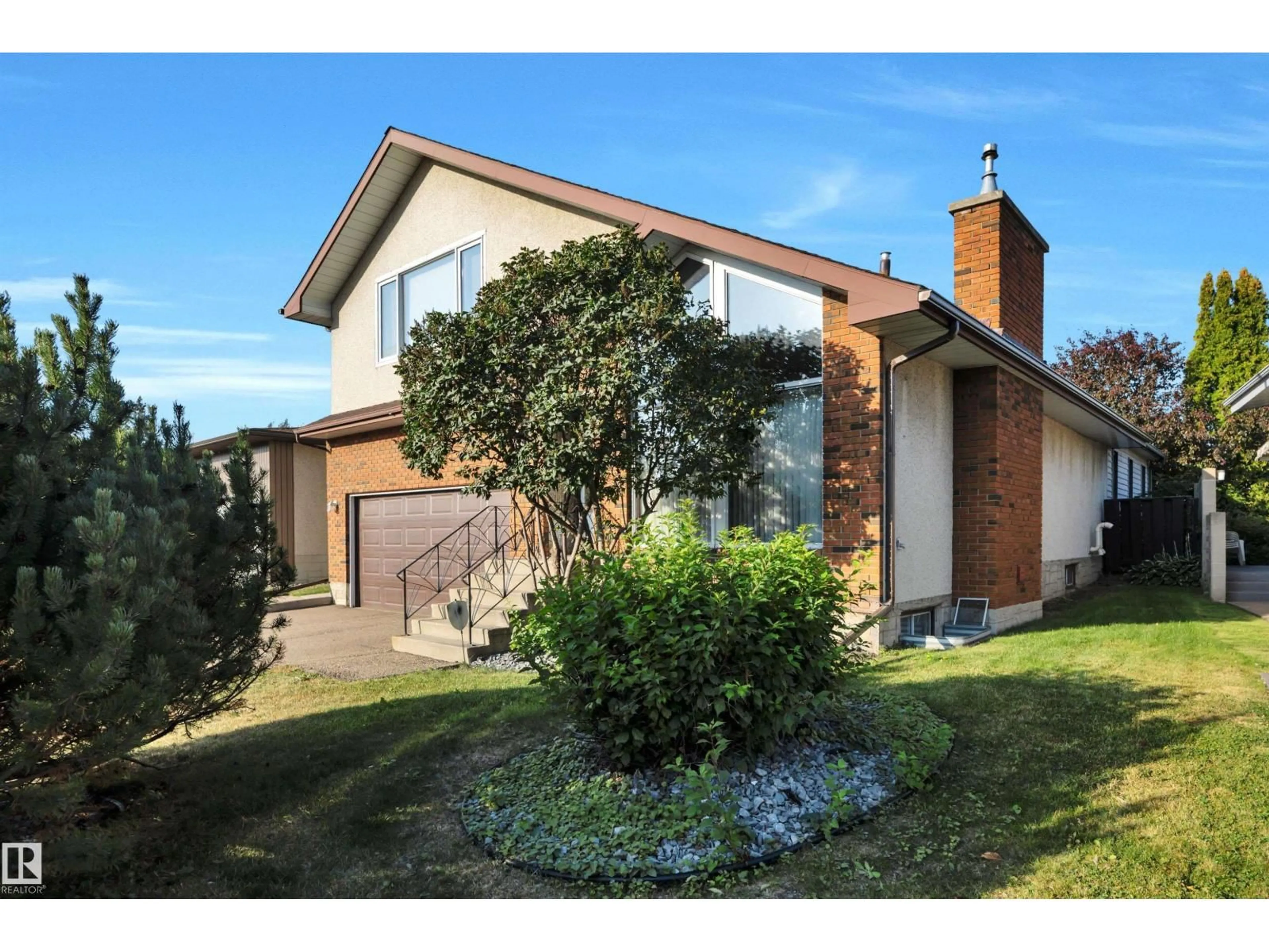 Home with brick exterior material, street for 10648 74 ST, Edmonton Alberta T6A2Y7