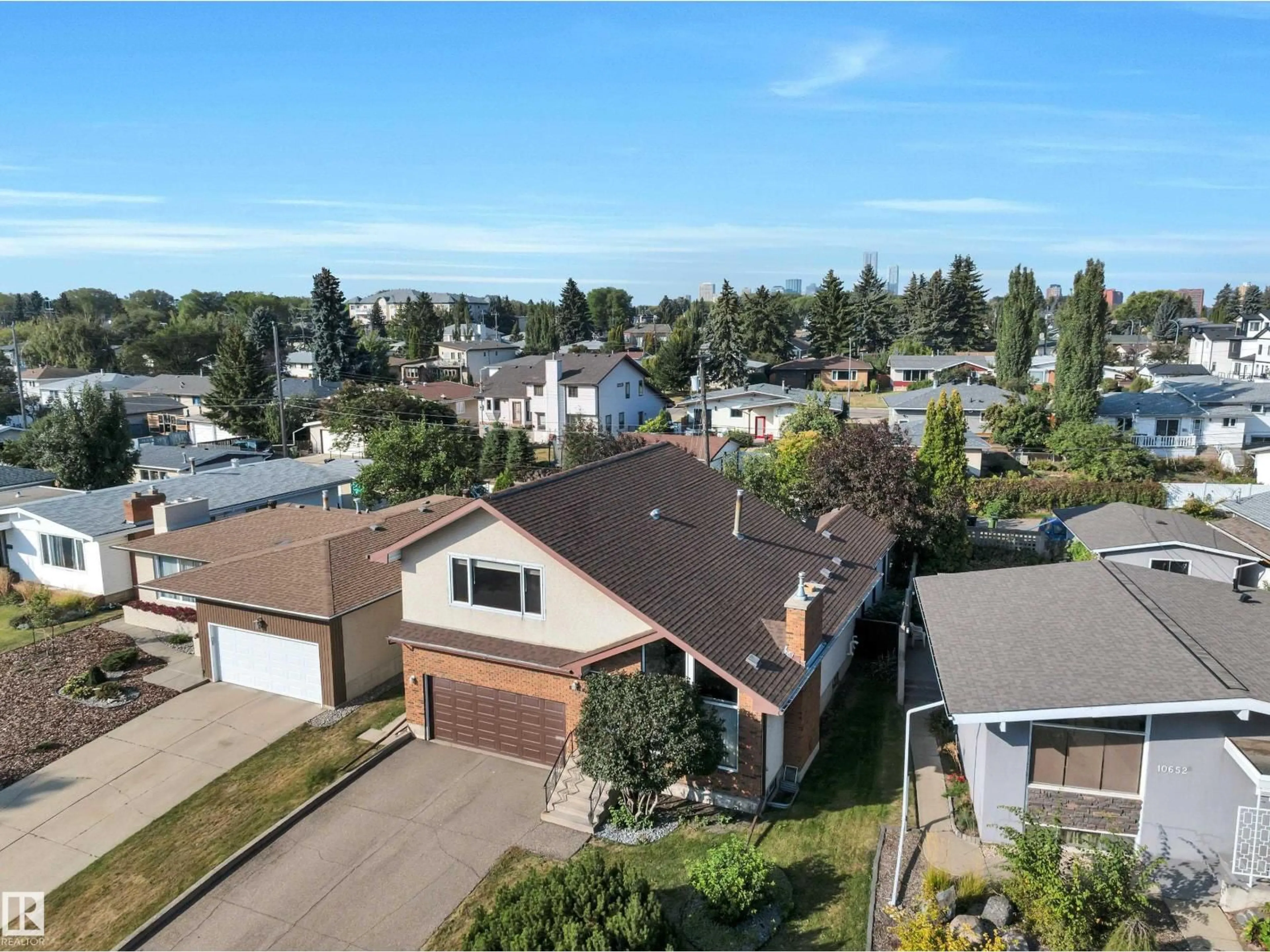 A pic from outside/outdoor area/front of a property/back of a property/a pic from drone, street for 10648 74 ST, Edmonton Alberta T6A2Y7