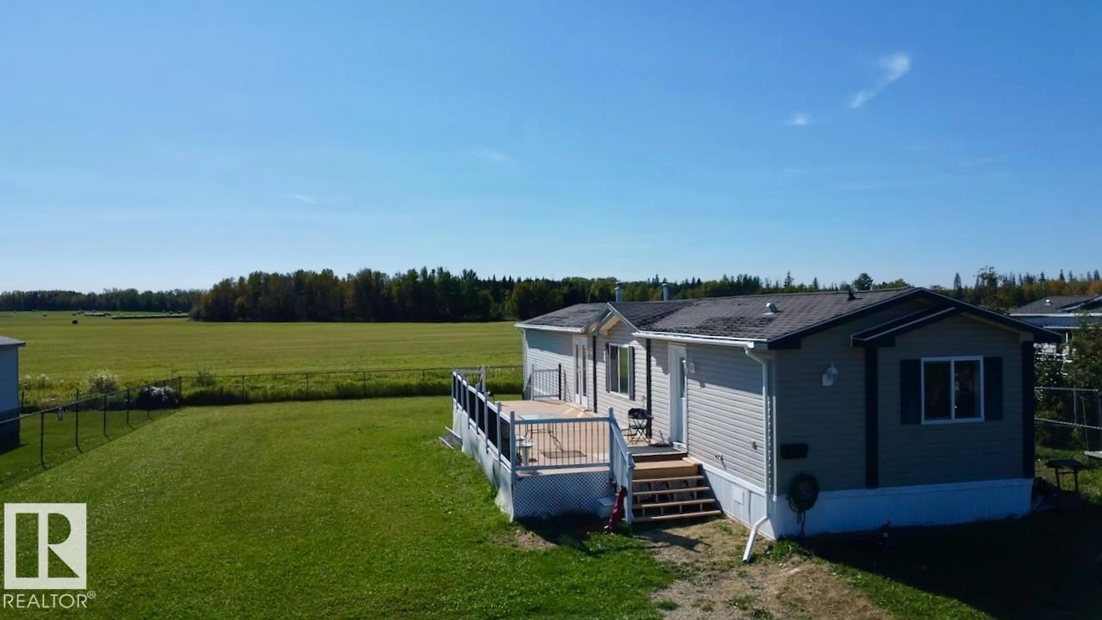 A pic from outside/outdoor area/front of a property/back of a property/a pic from drone, water/lake/river/ocean view for 153 - 3510 STE. ANNE TR, Rural Lac Ste. Anne County Alberta T0E0A0