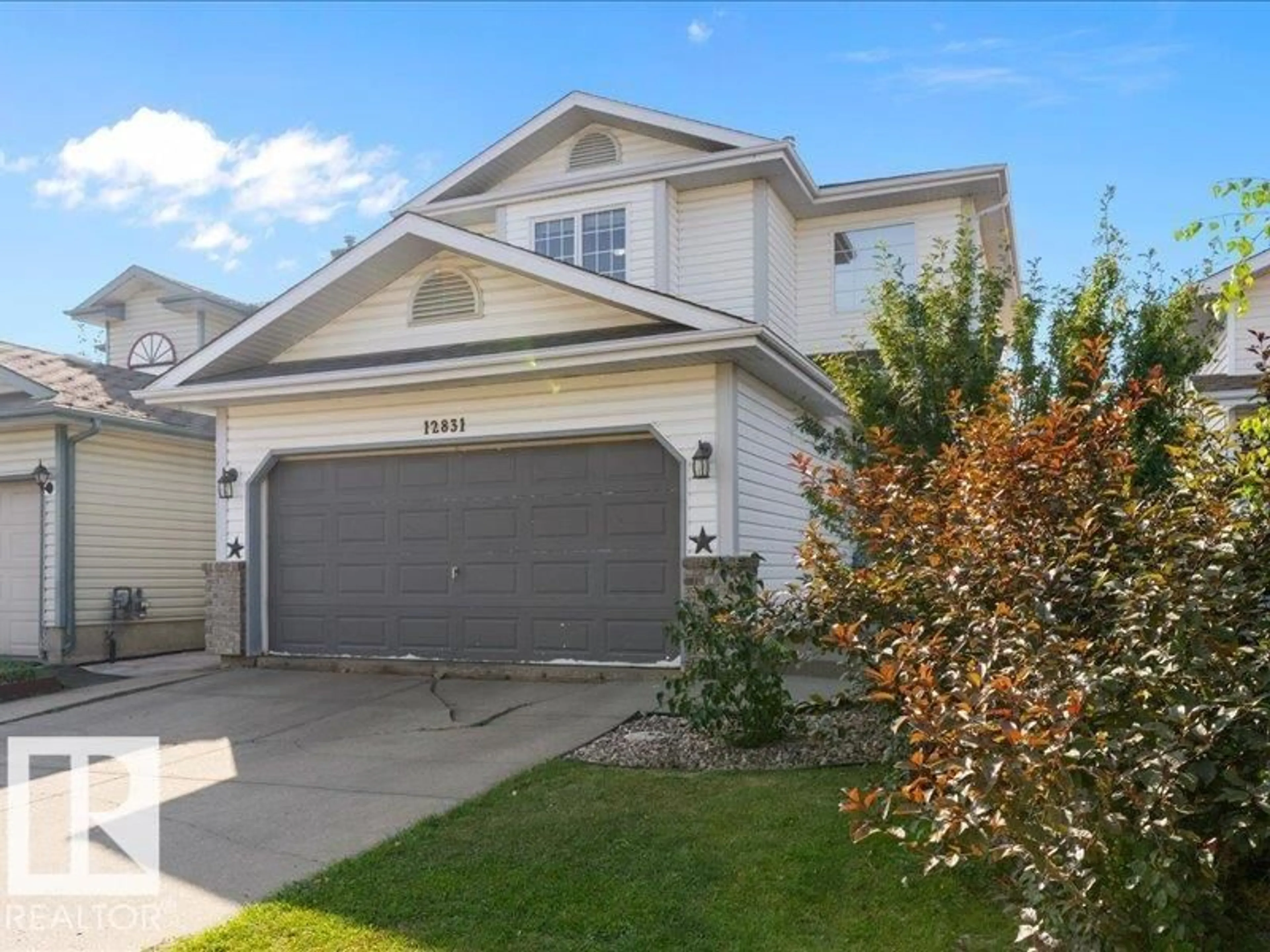 Home with vinyl exterior material, street for 12831 149 AV, Edmonton Alberta T6V1G1