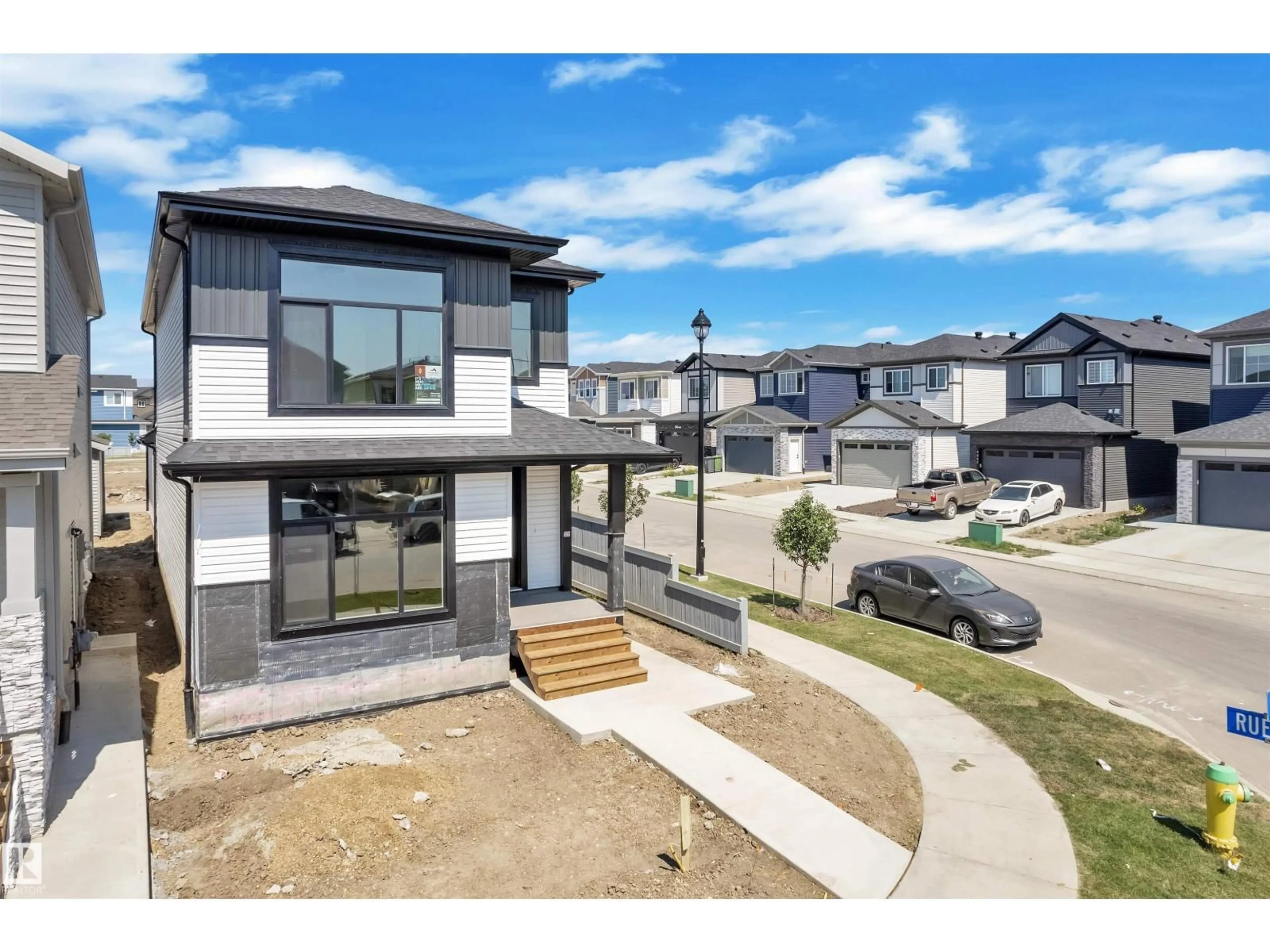 A pic from outside/outdoor area/front of a property/back of a property/a pic from drone, street for 3502 42 AV, Beaumont Alberta T4X3G4