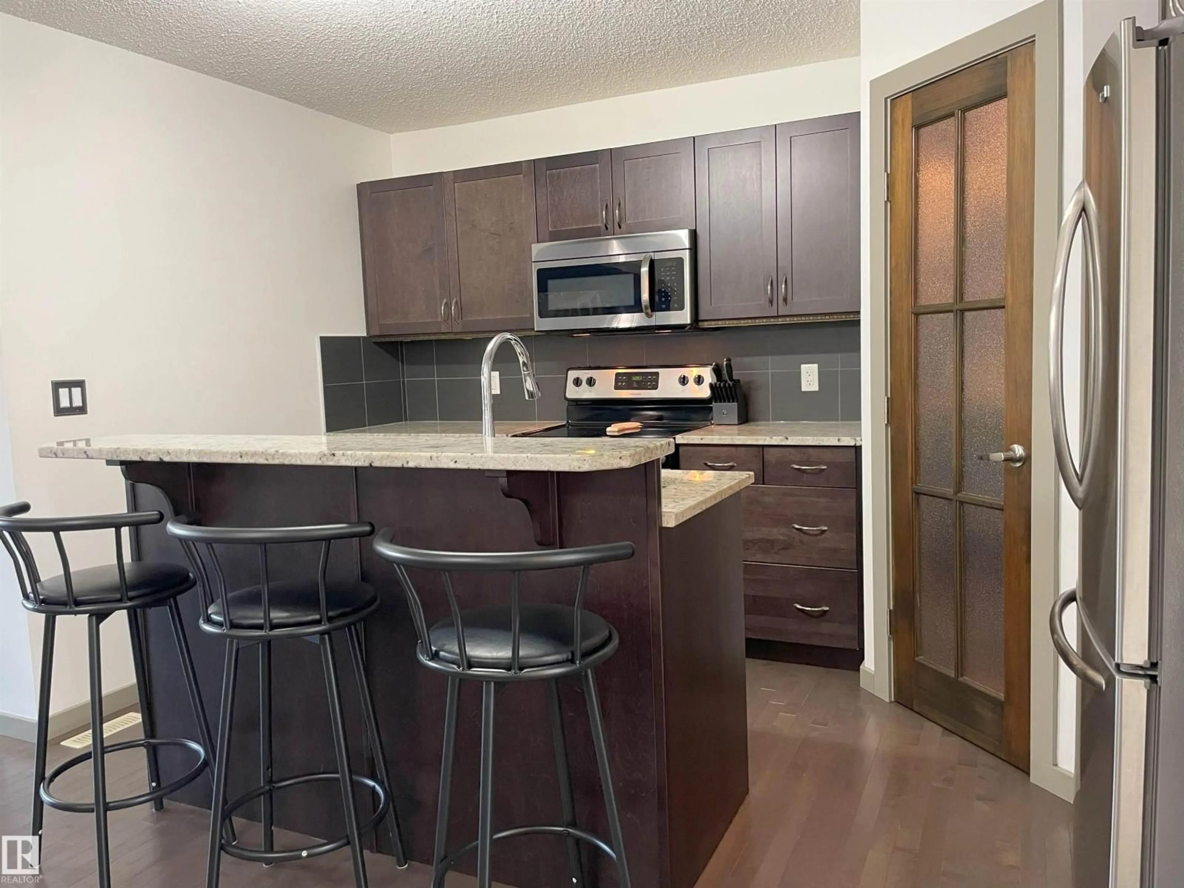 Standard kitchen, wood/laminate floor for 4212 ORCHARDS DR, Edmonton Alberta T6X1N9