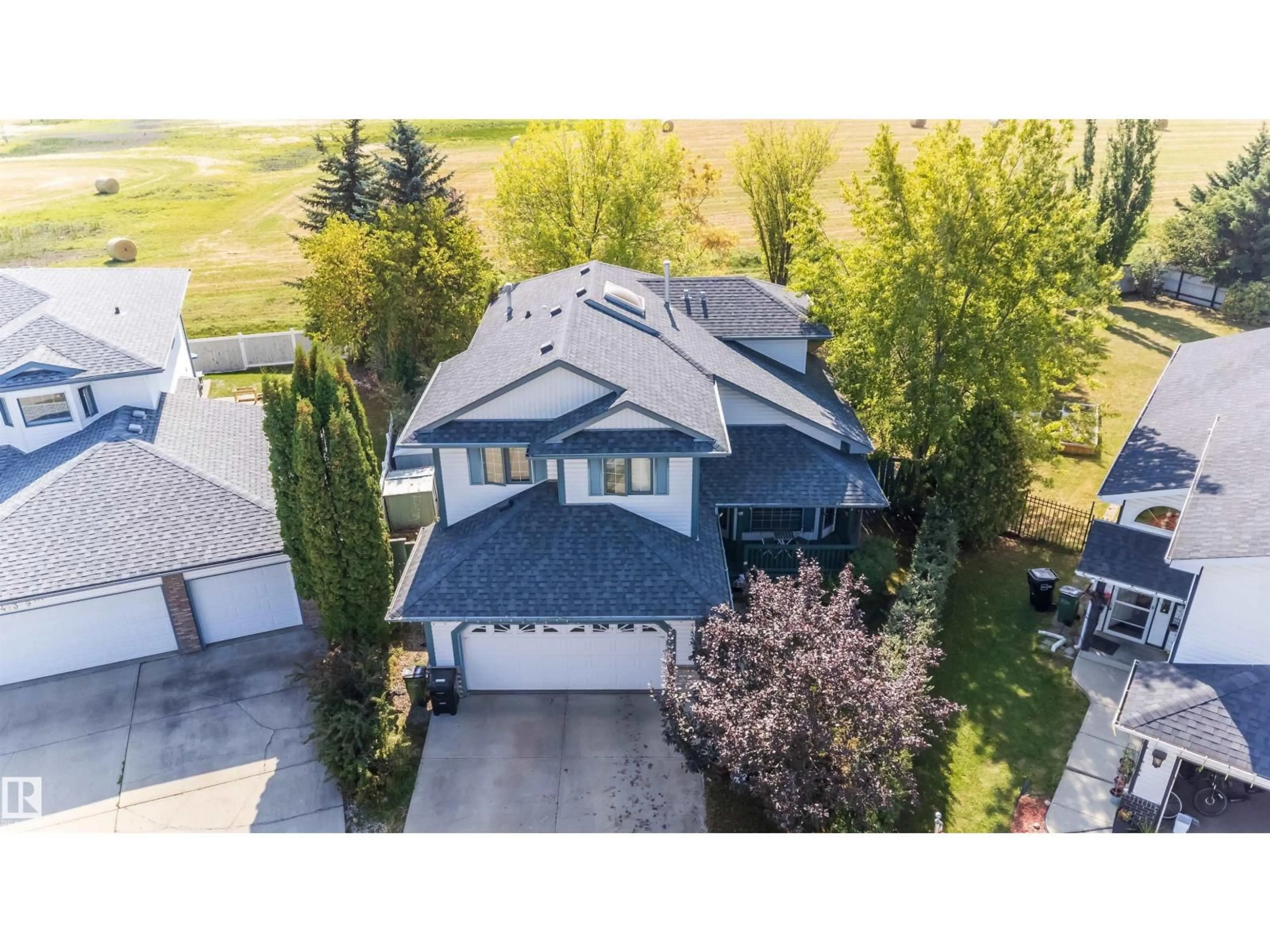 A pic from outside/outdoor area/front of a property/back of a property/a pic from drone, street for 11415 9 AV, Edmonton Alberta T6J6Z5