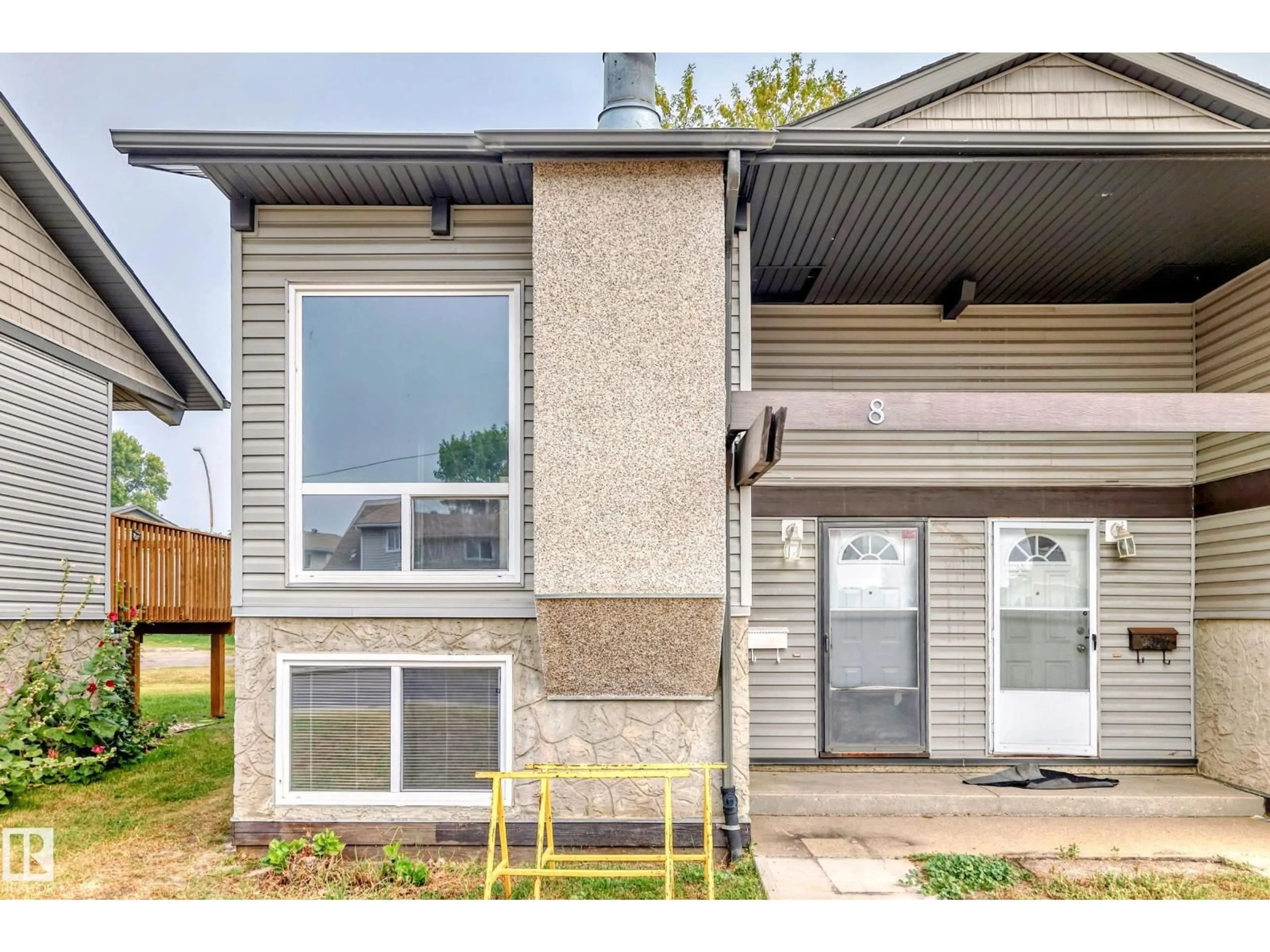 Home with vinyl exterior material, street for 8 NORTHWOODS VG NW, Edmonton Alberta T5X1T2