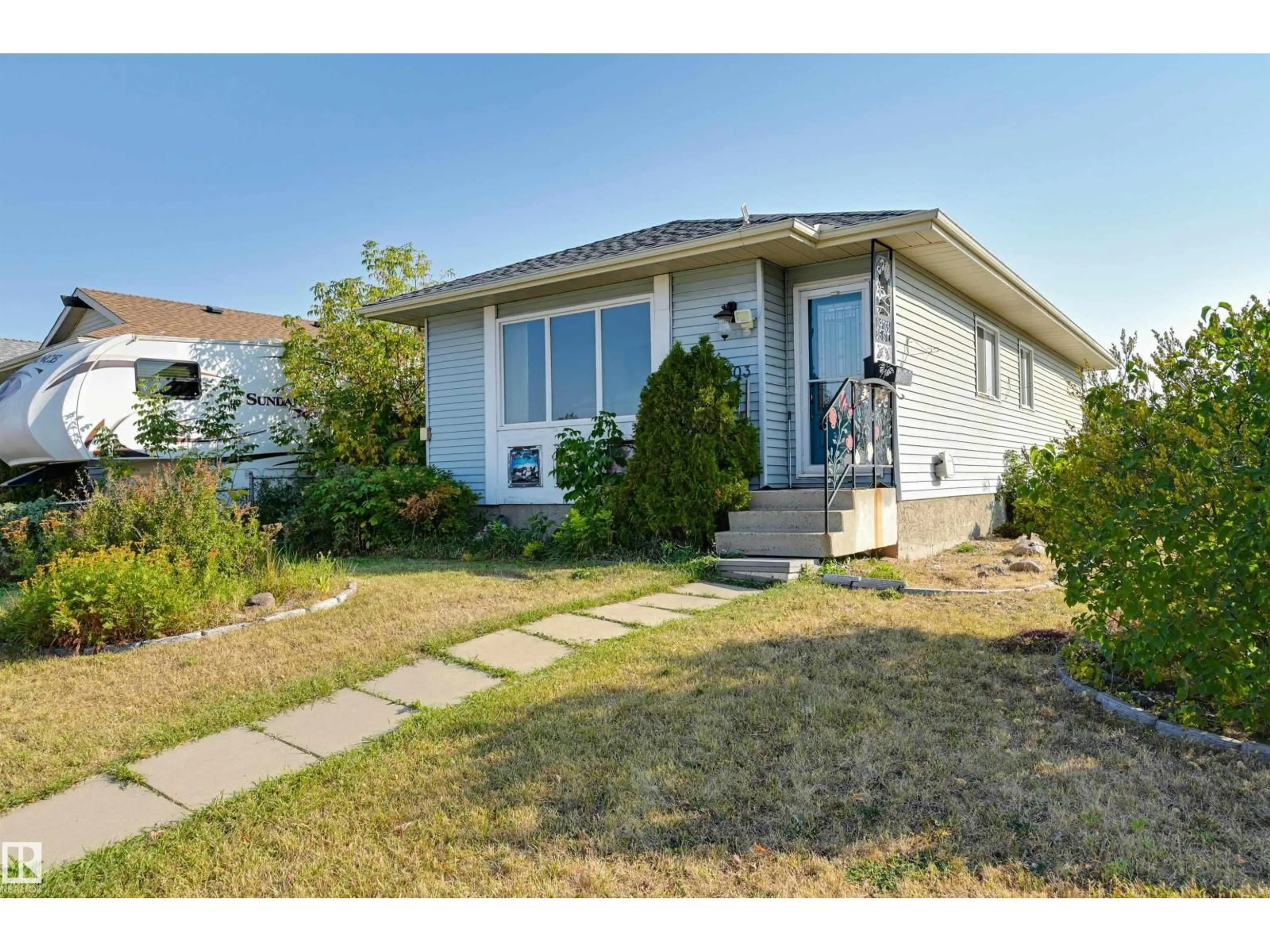 Home with vinyl exterior material, street for 14703 35 ST, Edmonton Alberta T5Y2H8