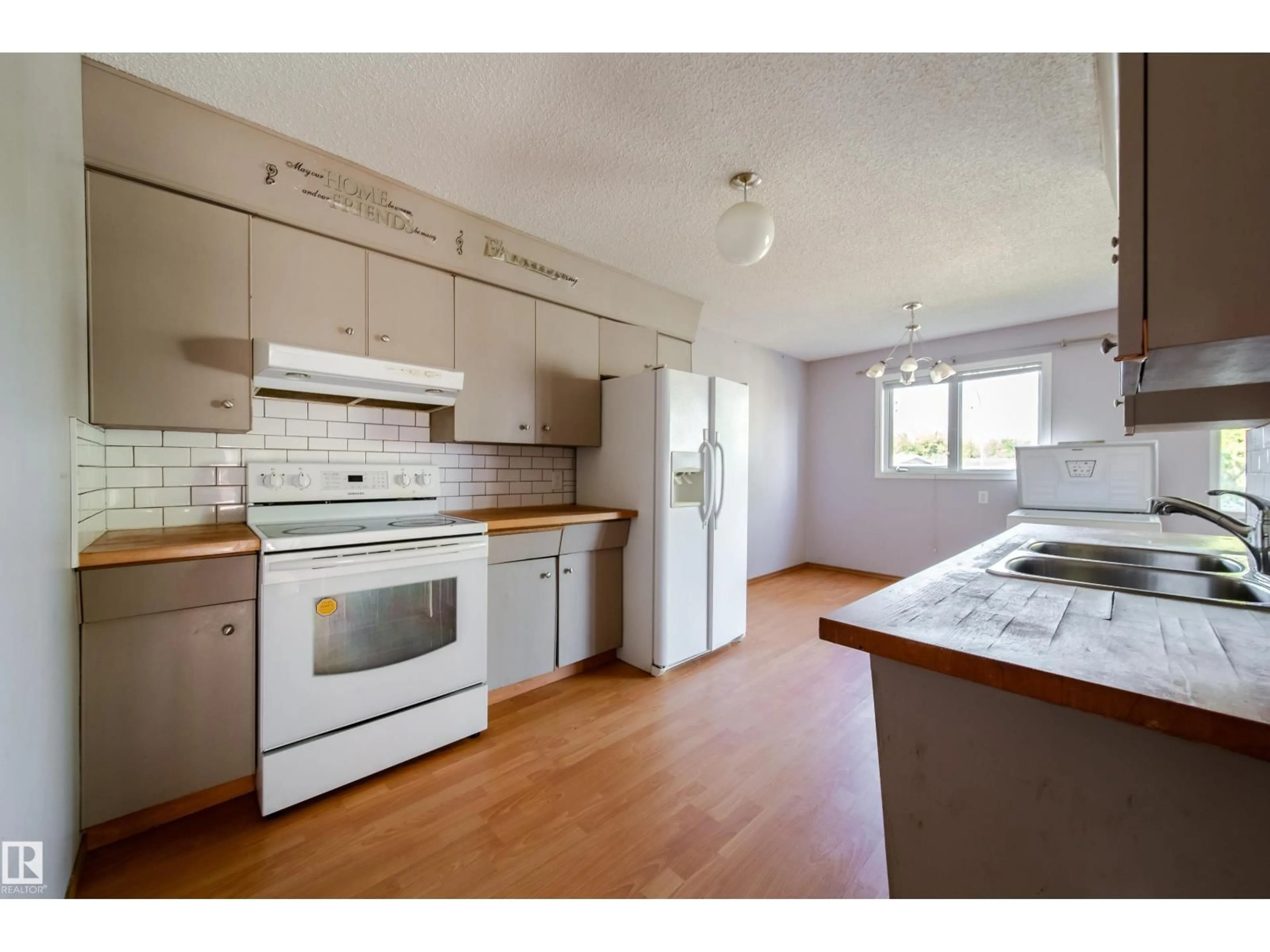 Standard kitchen, wood/laminate floor for 3119-3121 113 AV, Edmonton Alberta T5W0P3
