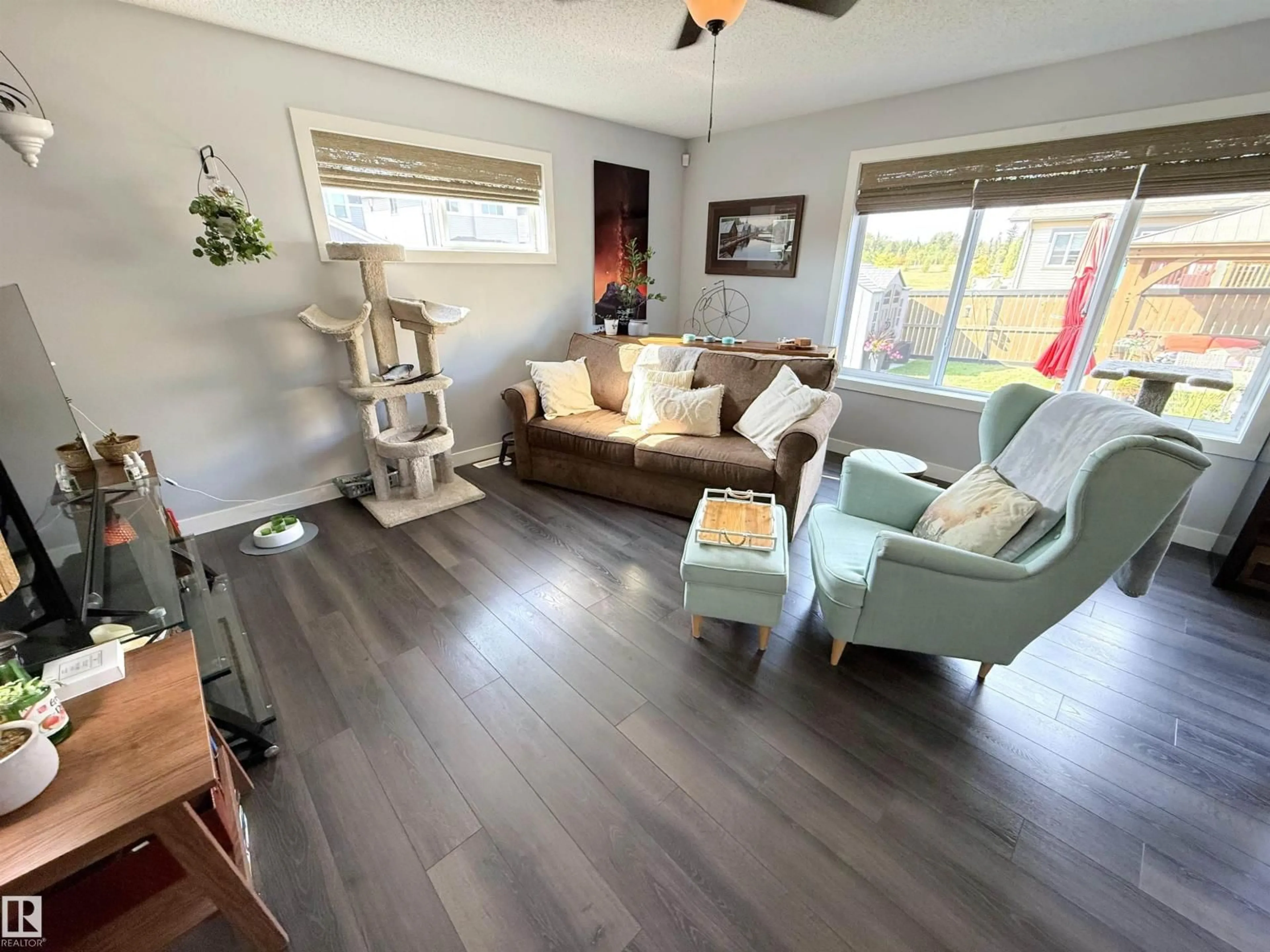 Living room with furniture, wood/laminate floor for 121 HARVEST RIDGE DR, Spruce Grove Alberta T7X0V9
