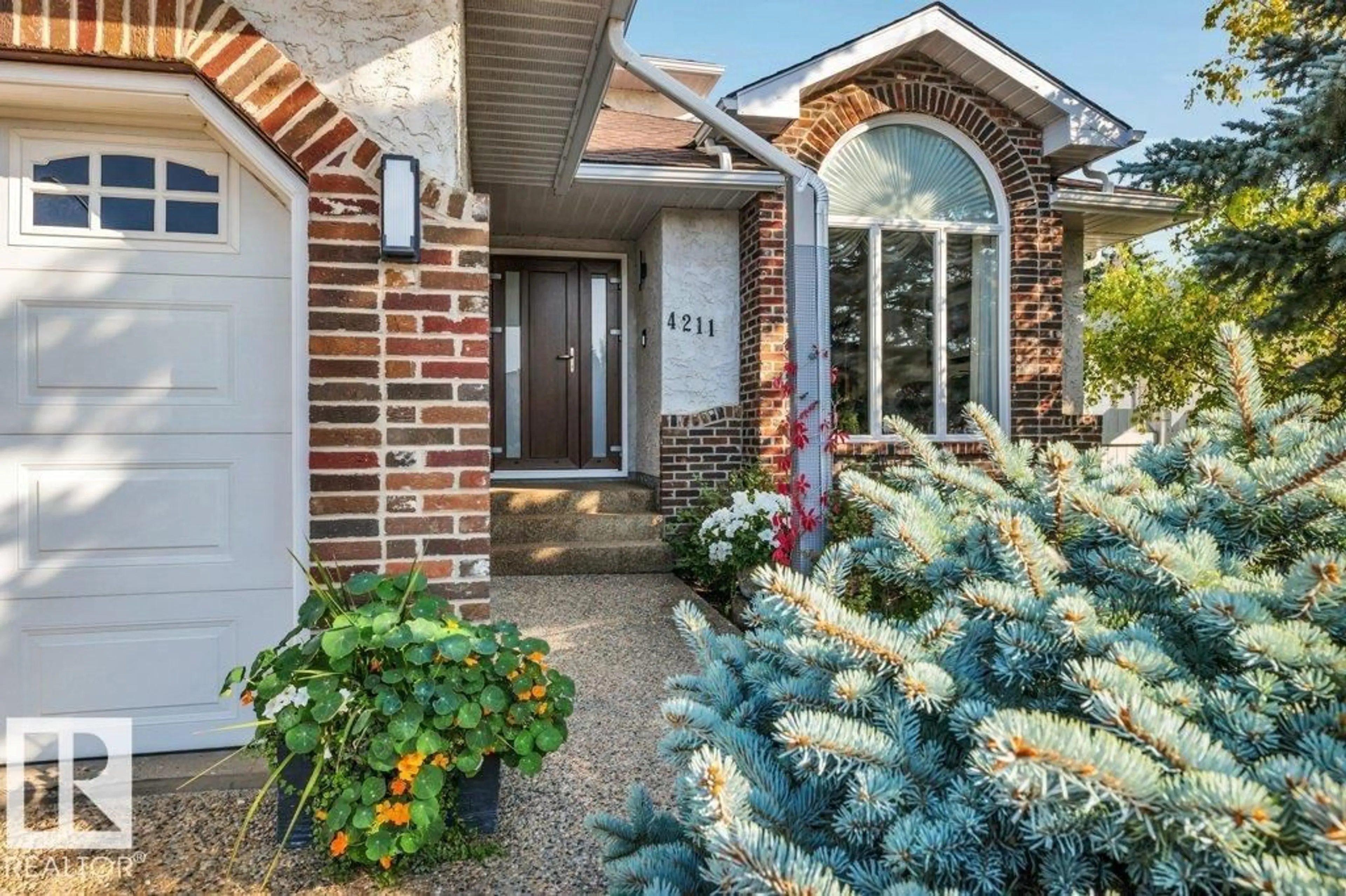 Home with brick exterior material, street for NW - 4211 48 ST, Edmonton Alberta T6L6J5