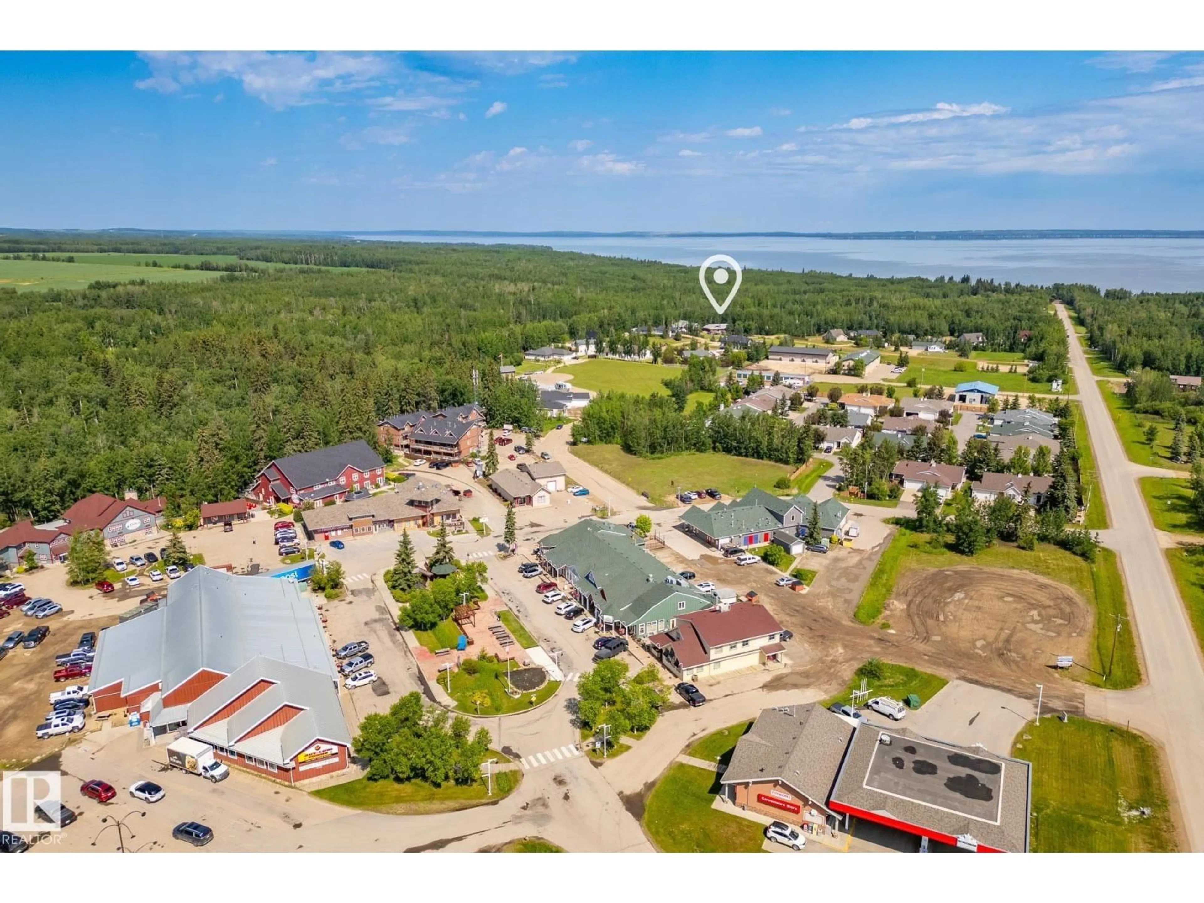 A pic from outside/outdoor area/front of a property/back of a property/a pic from drone, water/lake/river/ocean view for 462054 RGE ROAD 11, Rural Wetaskiwin County Alberta T0C2V0