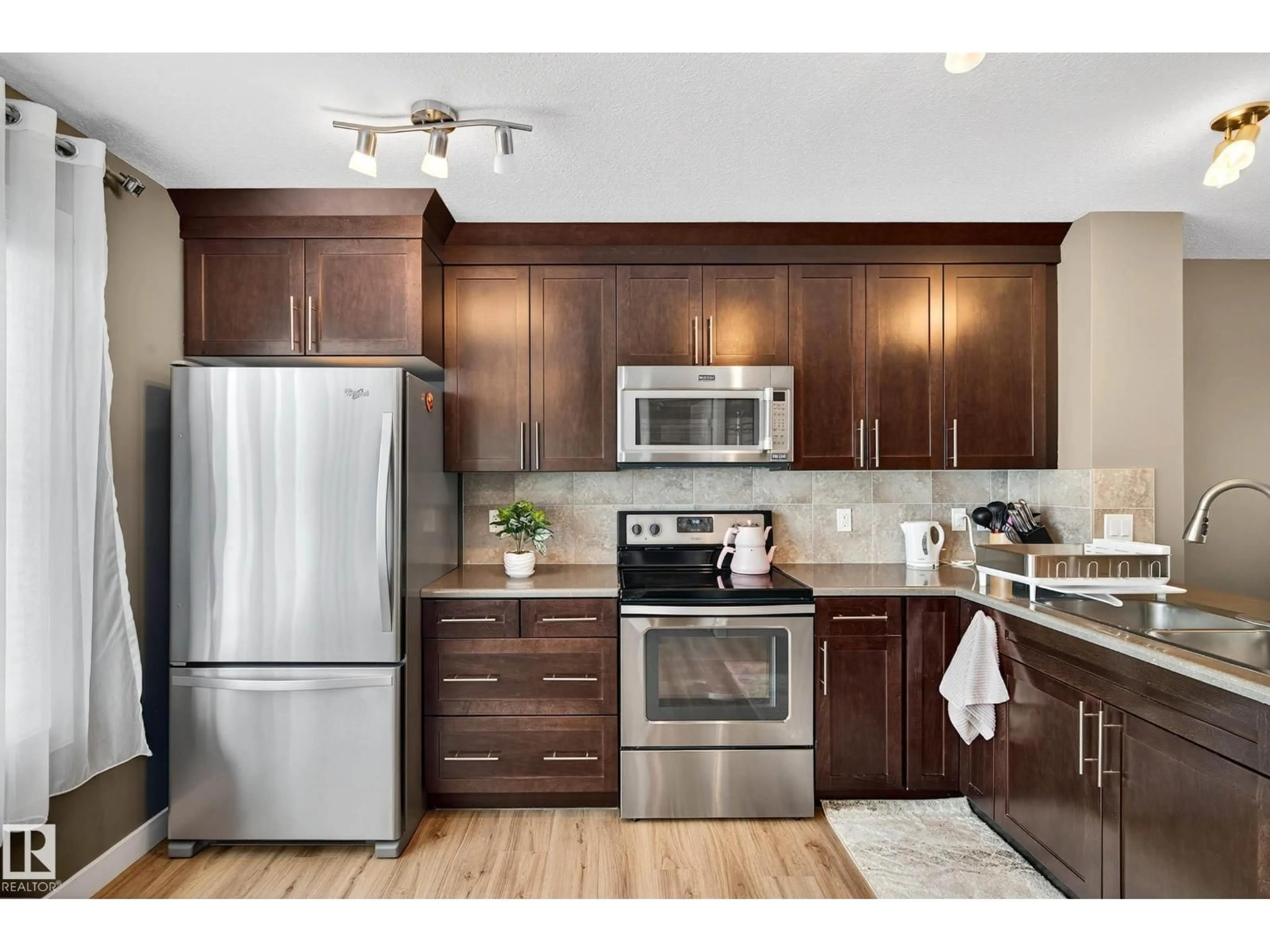 Open concept kitchen, unknown for 7327 EDGEMONT WY, Edmonton Alberta T6M0S1