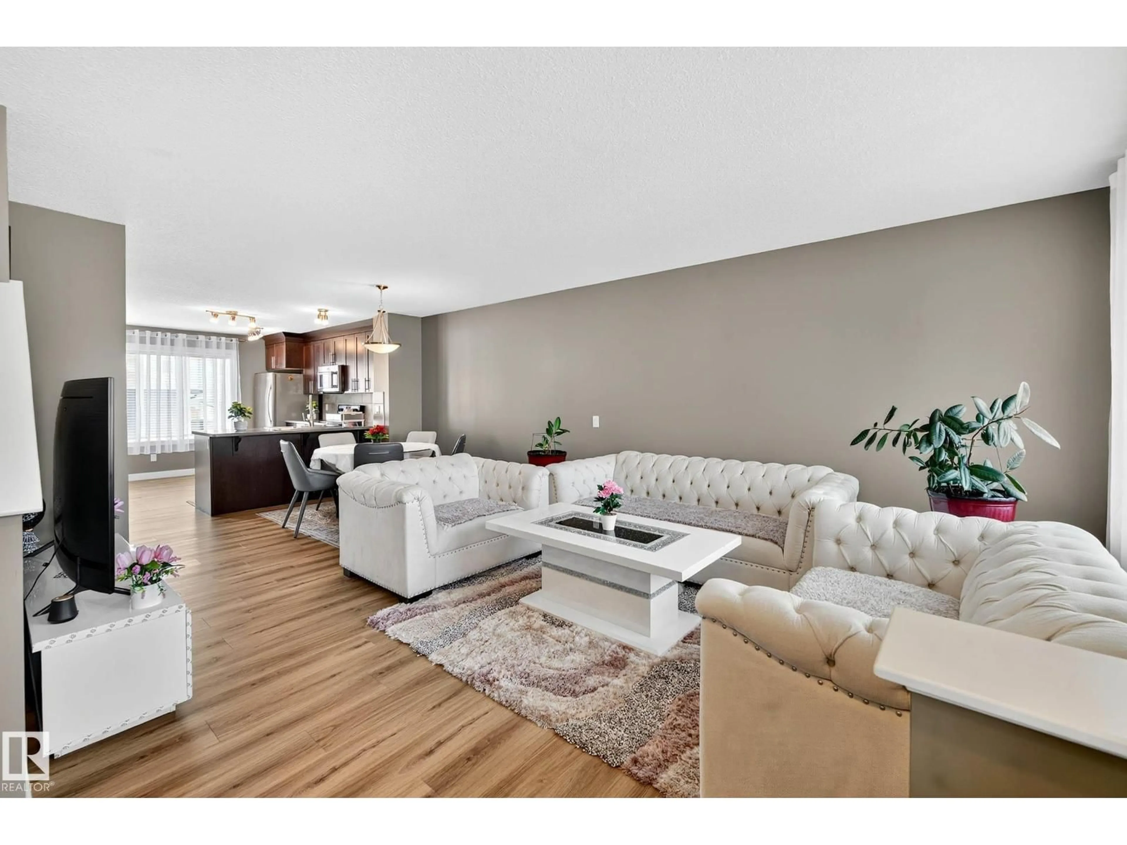 Living room with furniture, unknown for 7327 EDGEMONT WY, Edmonton Alberta T6M0S1