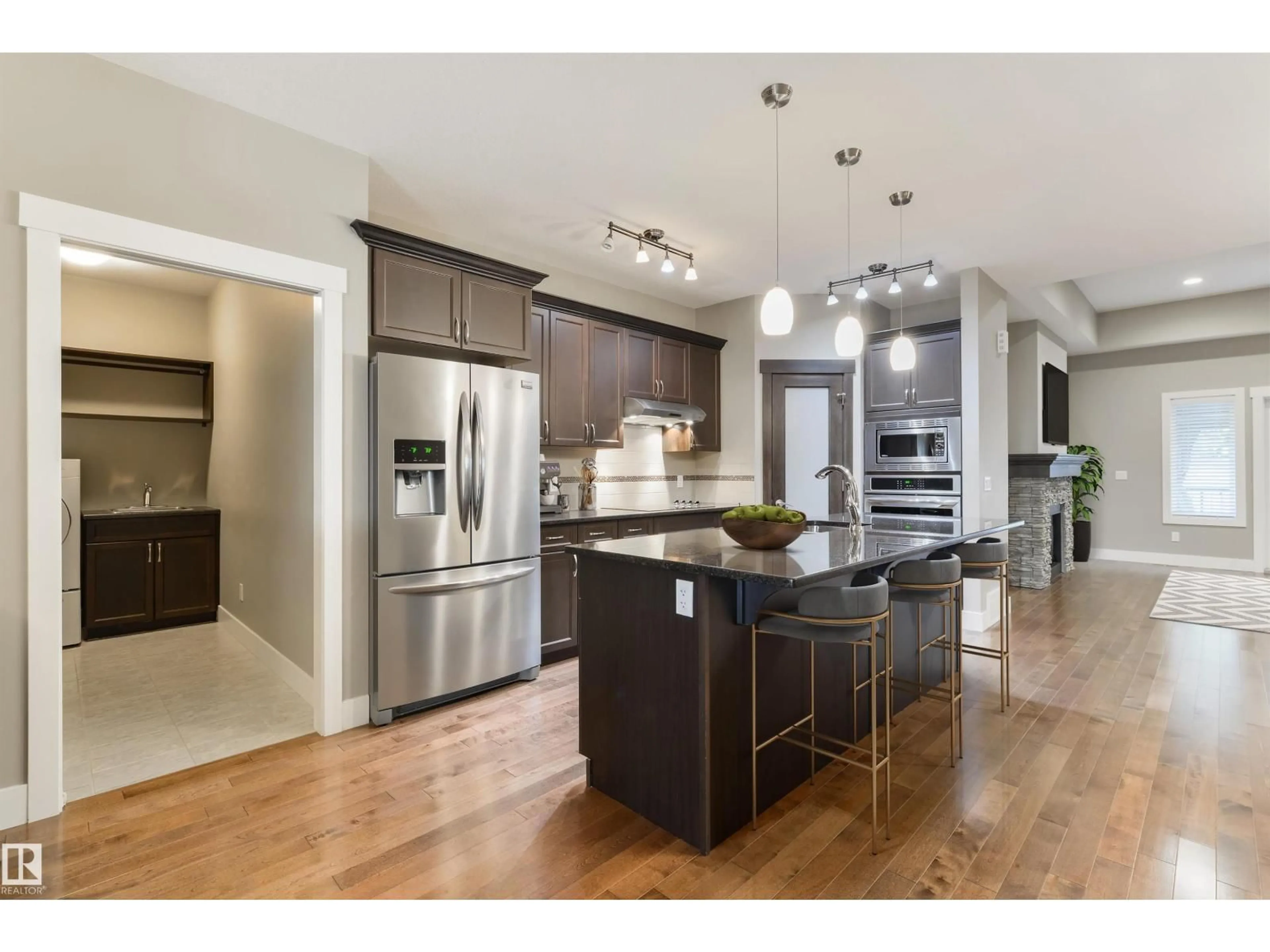 Open concept kitchen, wood/laminate floor for #132 - 132 HEATHERGLEN DR, Spruce Grove Alberta T7X0R6