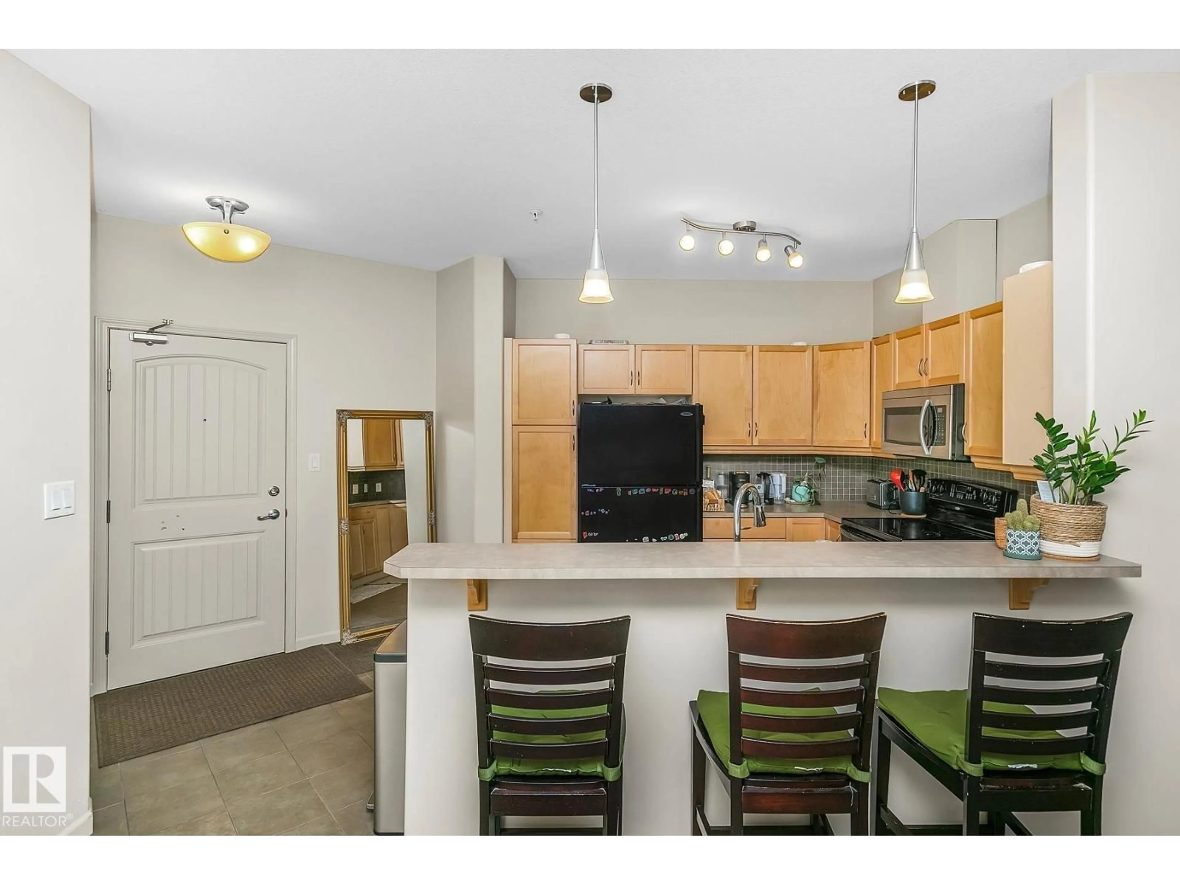 Open concept kitchen, unknown for #212 - 2503 HANNA CR, Edmonton Alberta T6R0H3