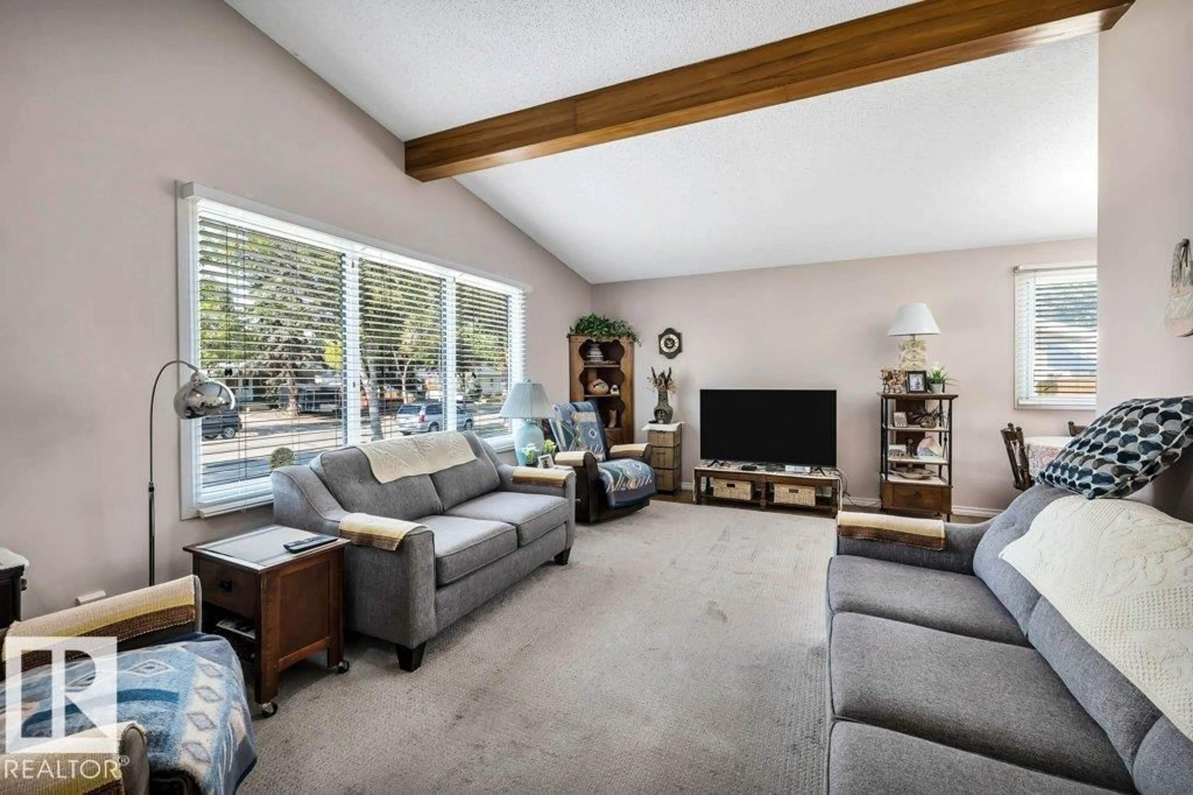 Living room with furniture, unknown for 100 AKINS DR, St. Albert Alberta T8N2P6