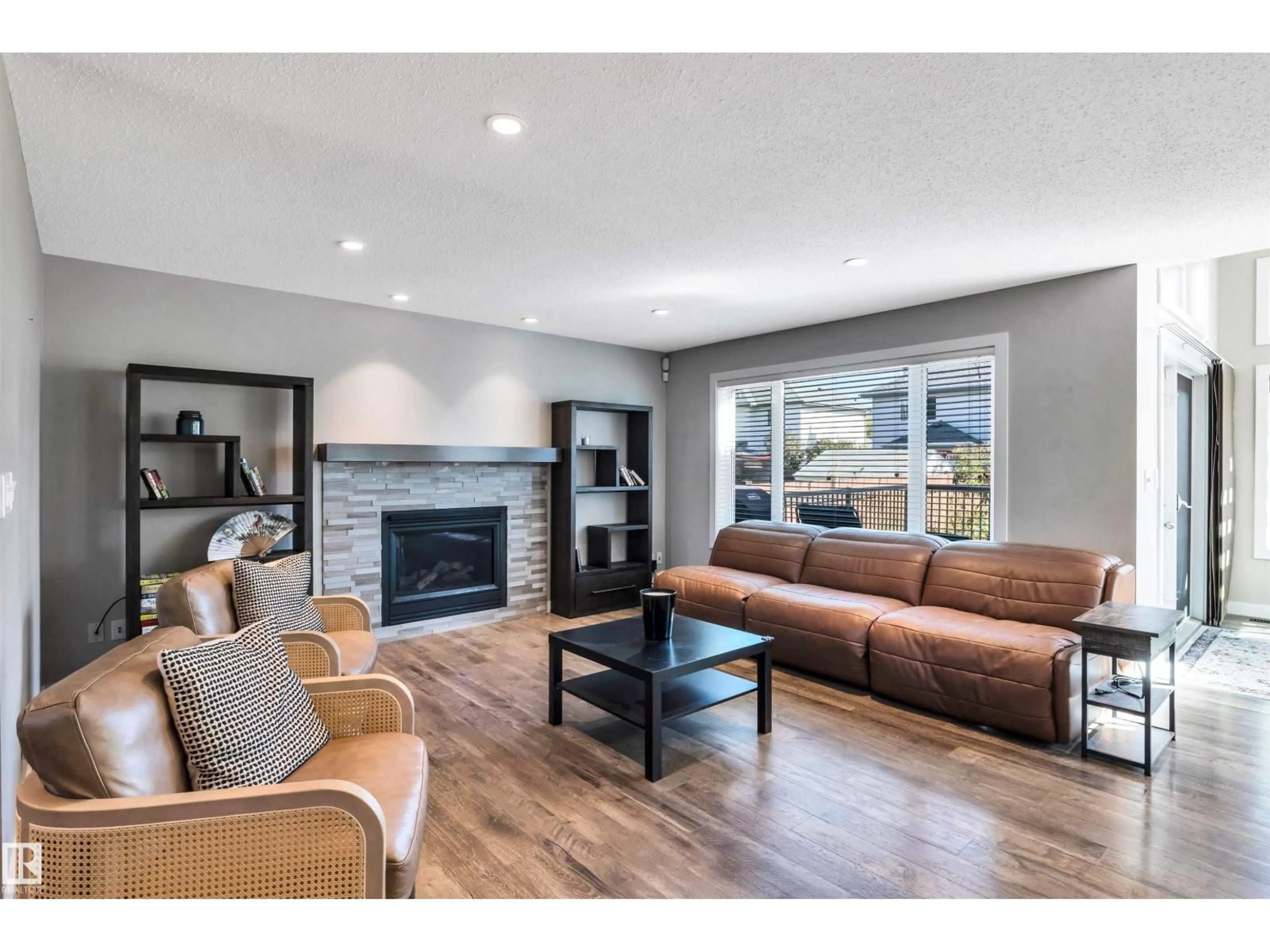 Living room with furniture, wood/laminate floor for 13 DUROCHER ST, St. Albert Alberta T8N6G8