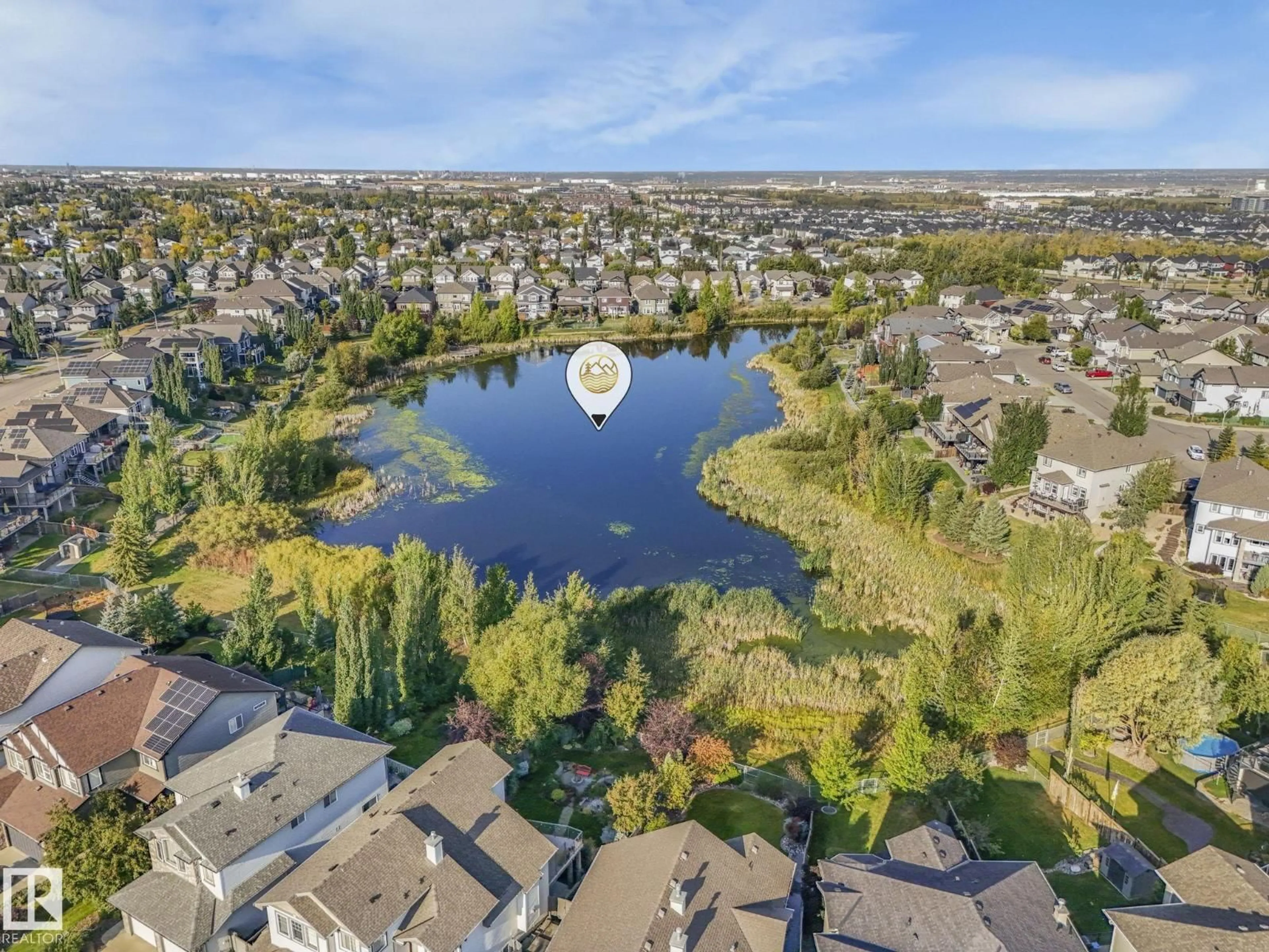 A pic from outside/outdoor area/front of a property/back of a property/a pic from drone, water/lake/river/ocean view for 337 COWAN CR, Sherwood Park Alberta T8H0E4